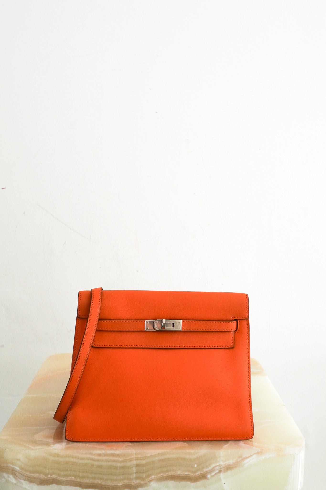 Hermès Kelly Danse II Orange in Swift Leather | Authentic Preloved - Reloved Again