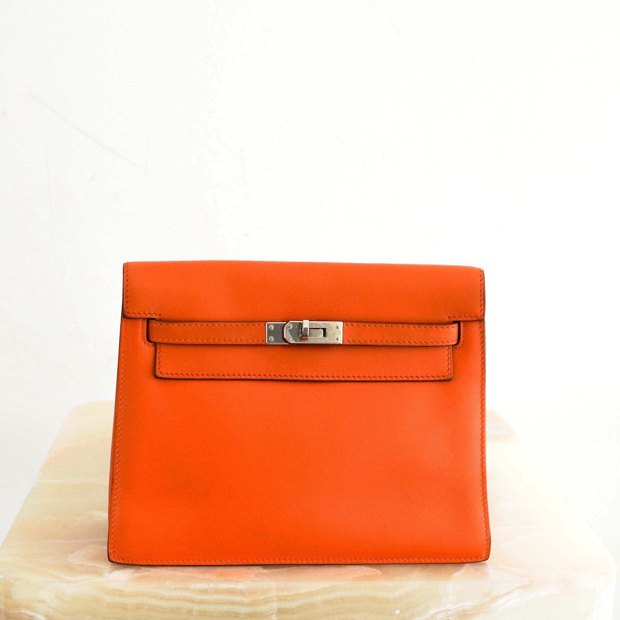Hermès Kelly Danse II Orange in Swift Leather | Authentic Preloved - Reloved Again