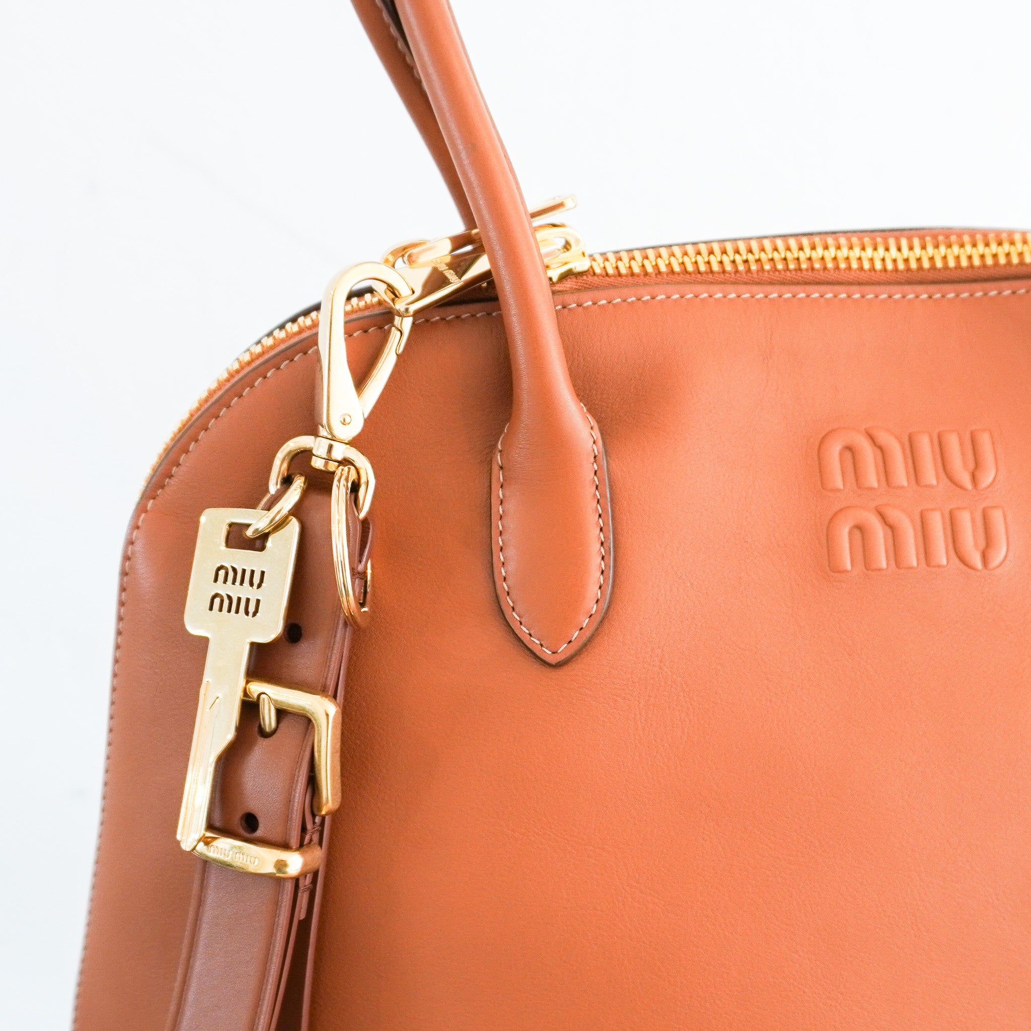 Miu-Miu-Brown-Leather-Bag-Charm-/-Keyring-side-picture