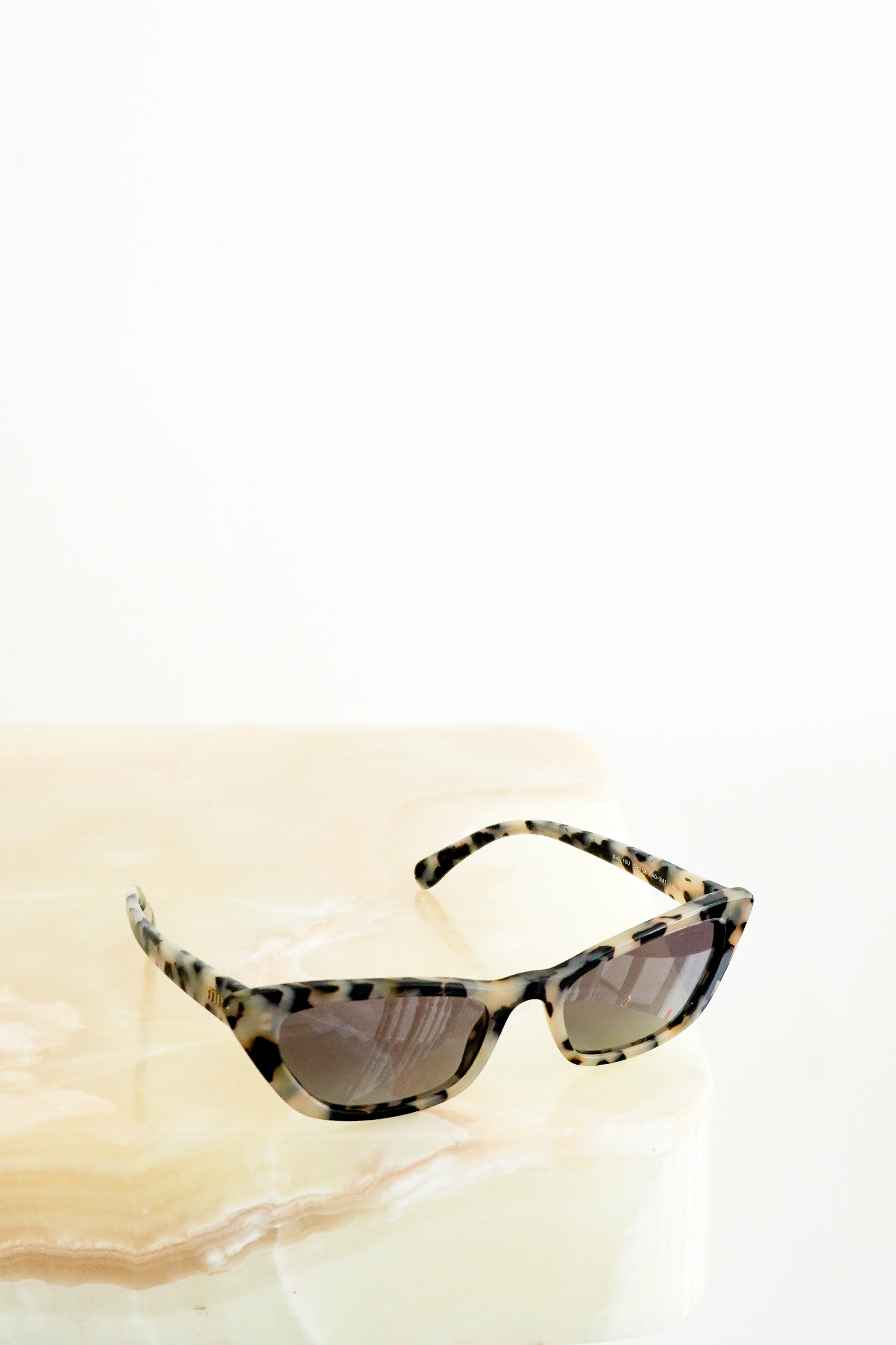 Miu Miu SMU 10U KAD-3M1 Tortoiseshell Cat Eye Sunglasses front photo chelsea london
