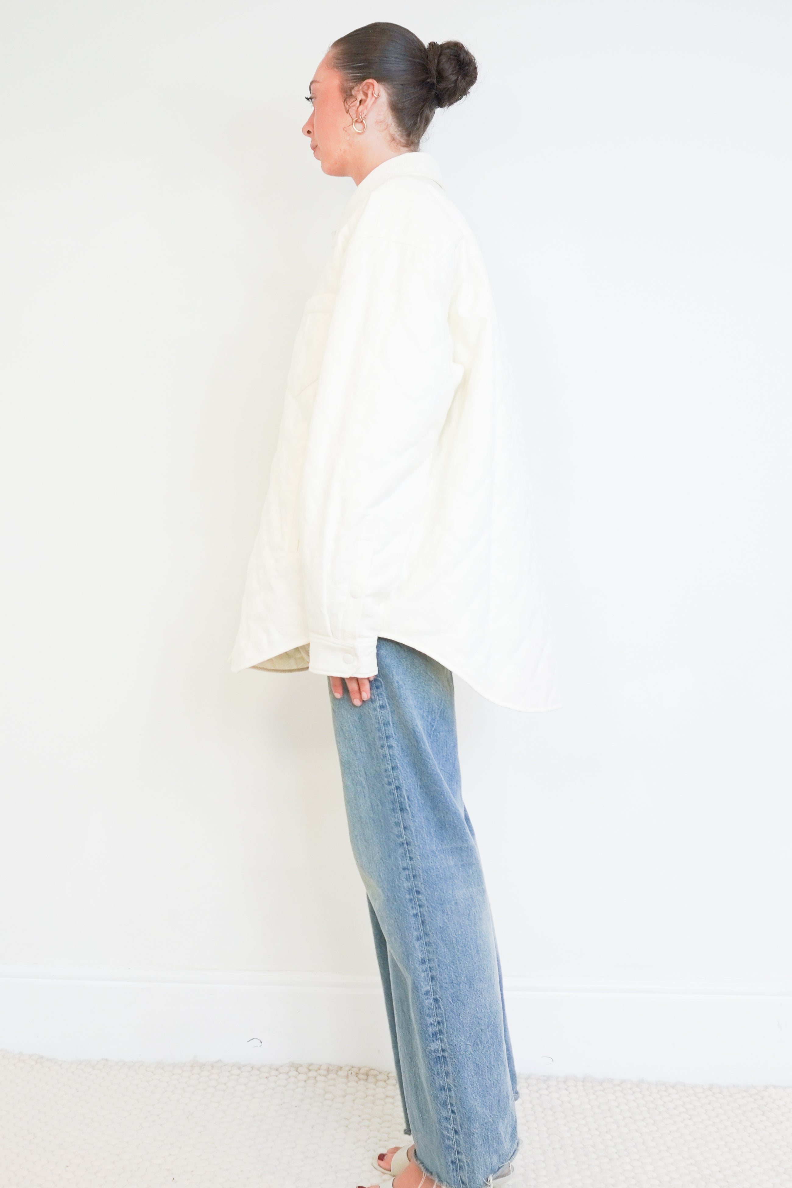side photo of a NEW Gucci White GG Monogram Quilted Overshirt Jacket