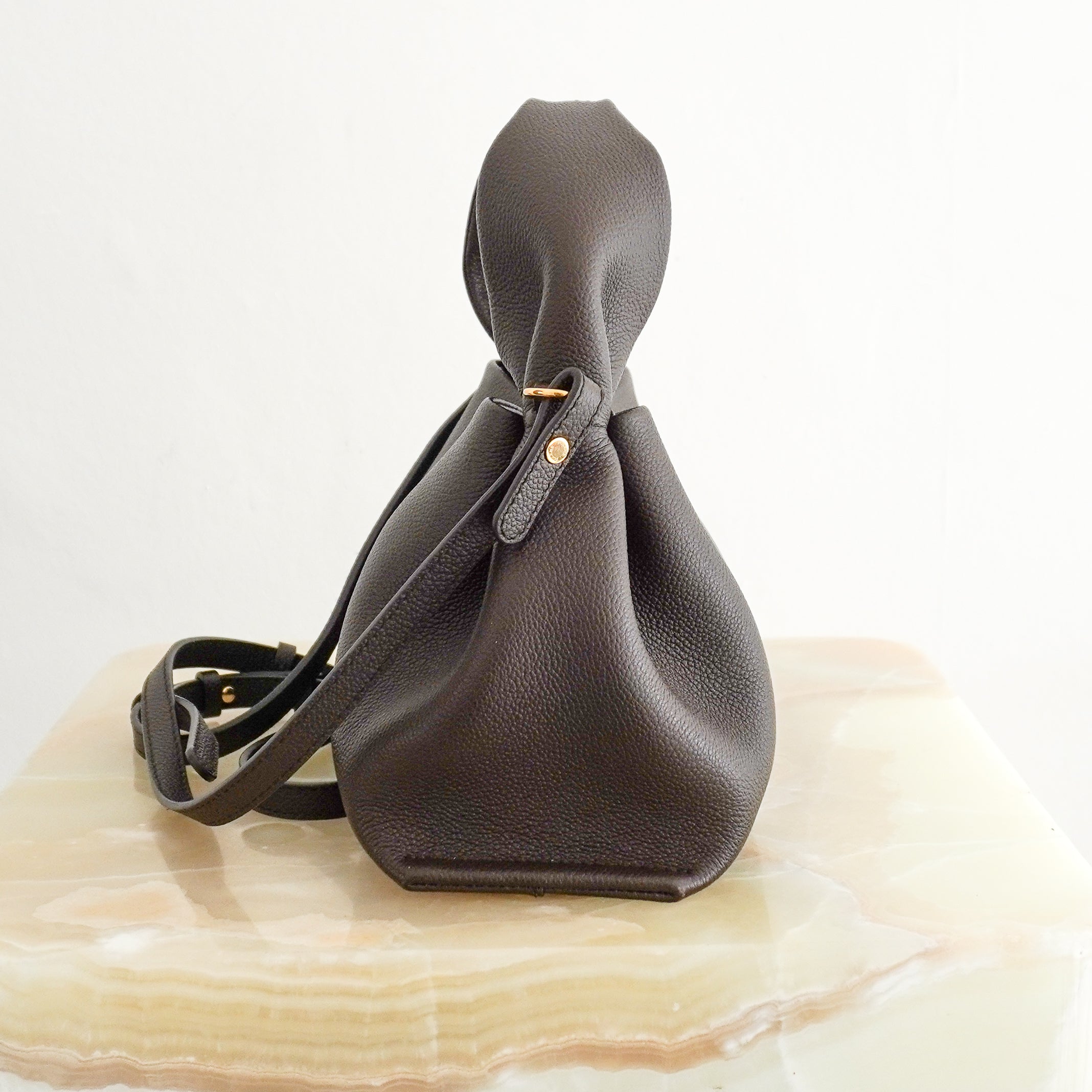 Polène Numéro Neuf Mini Textured Leather Bag in Ebony side photo chelsea london