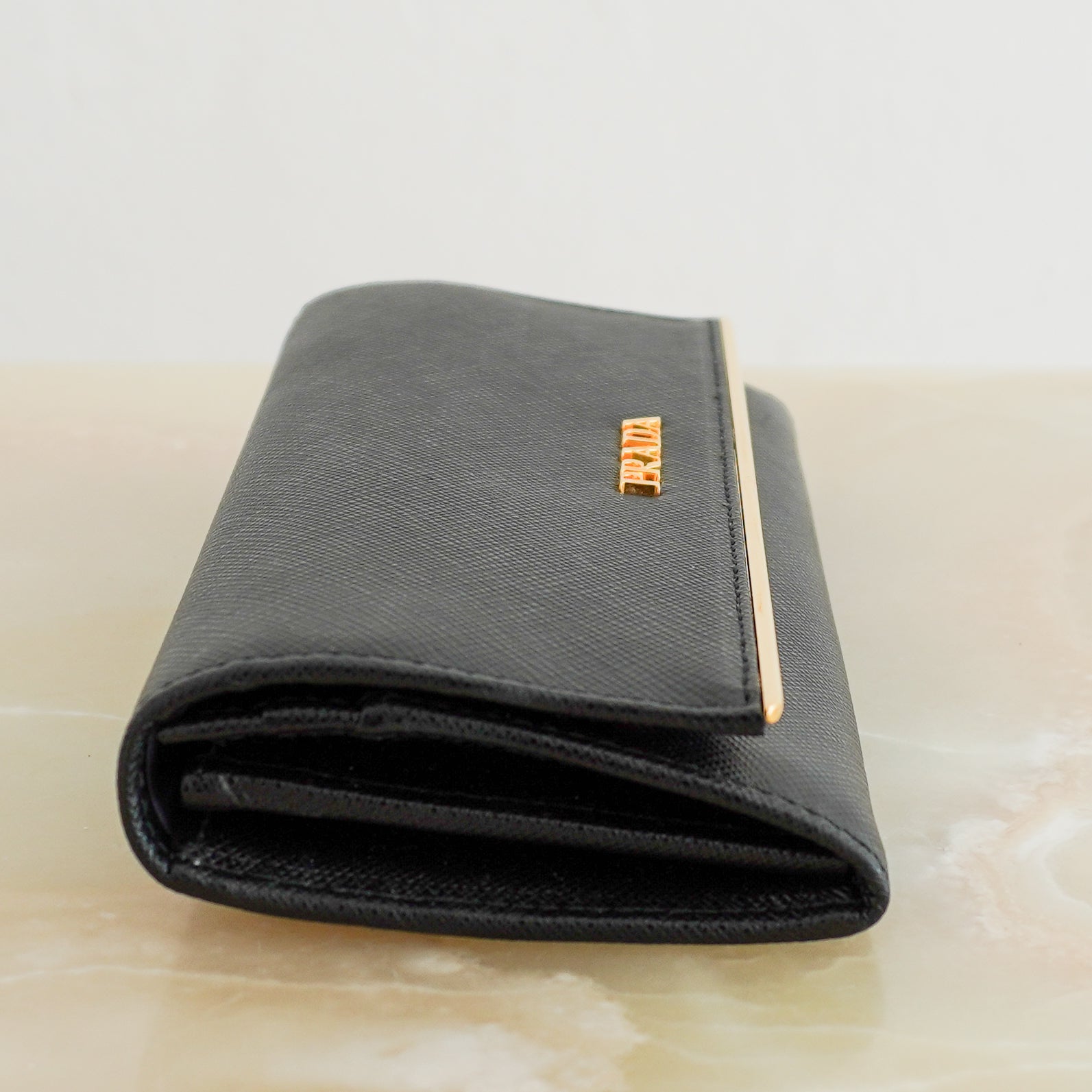 Prada Black Saffiano Leather Clutch Wallet side photo chelsea london