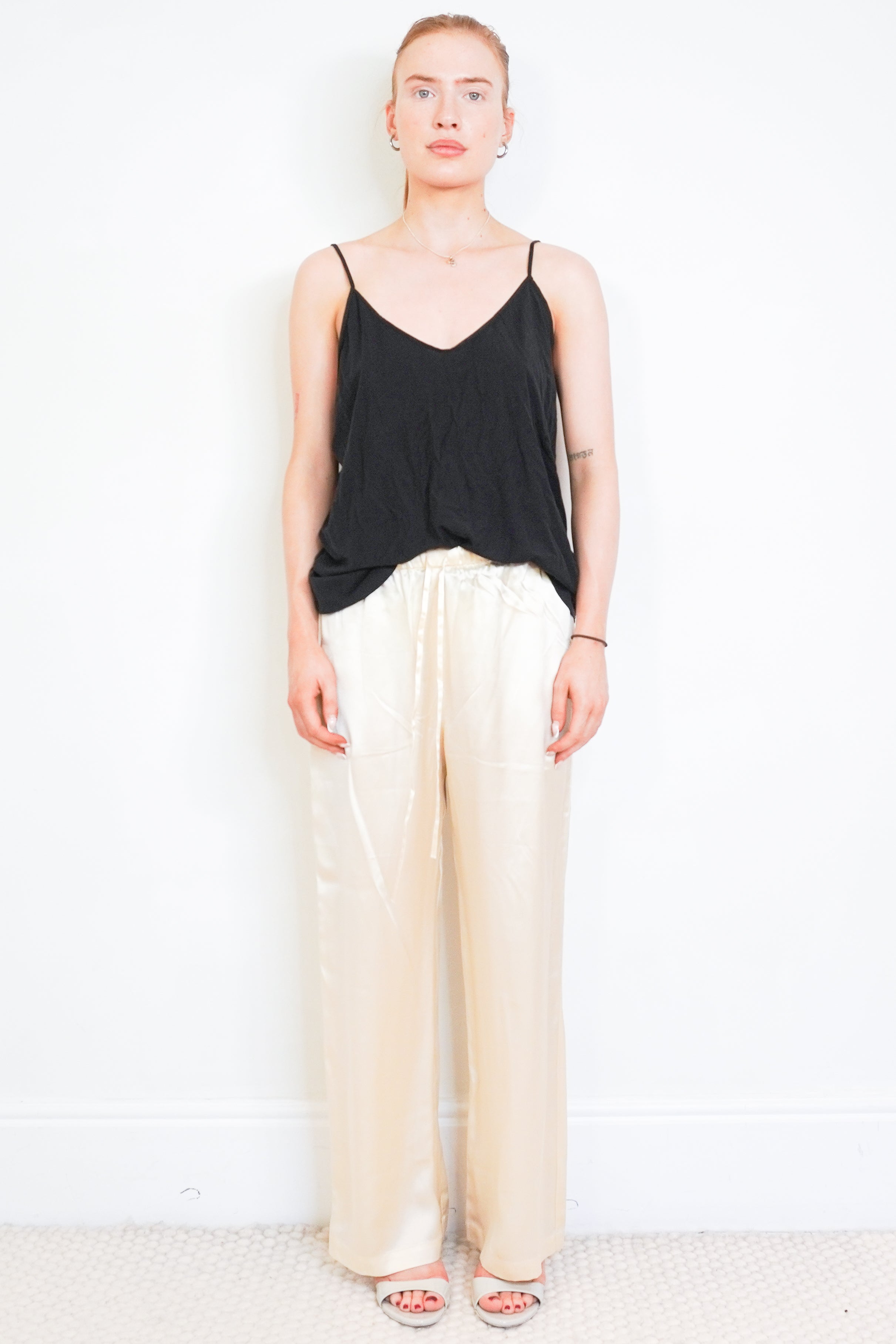 Reformation Cream Satin Wide Leg Trousers front photo chelsea london