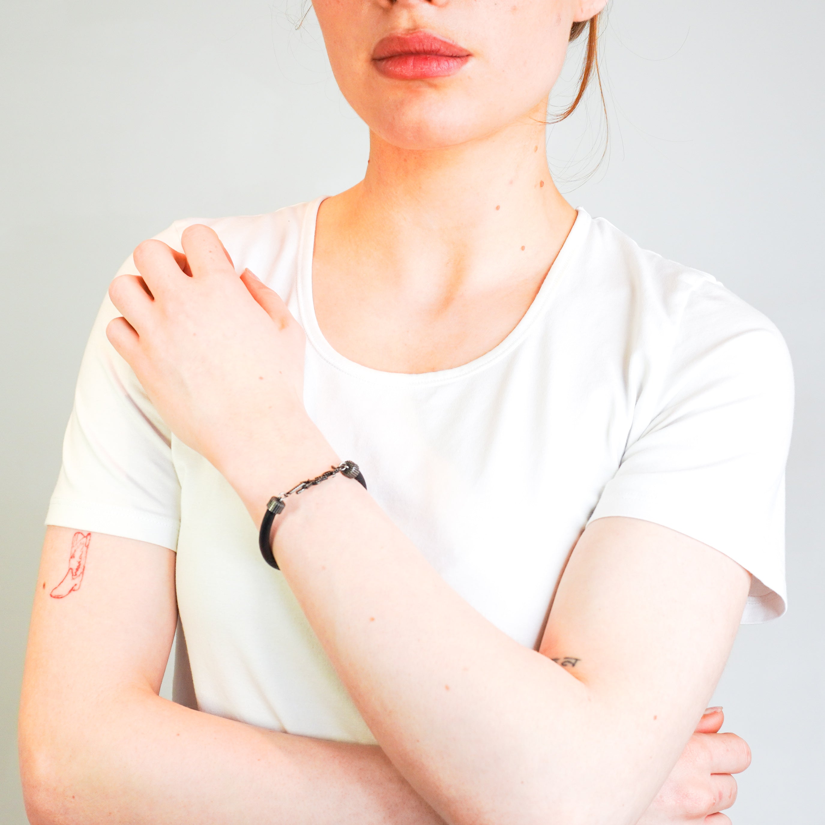 Saint-Laurent-Black-Leather-YSL-Bracelet-model-picture-Chelsea-London