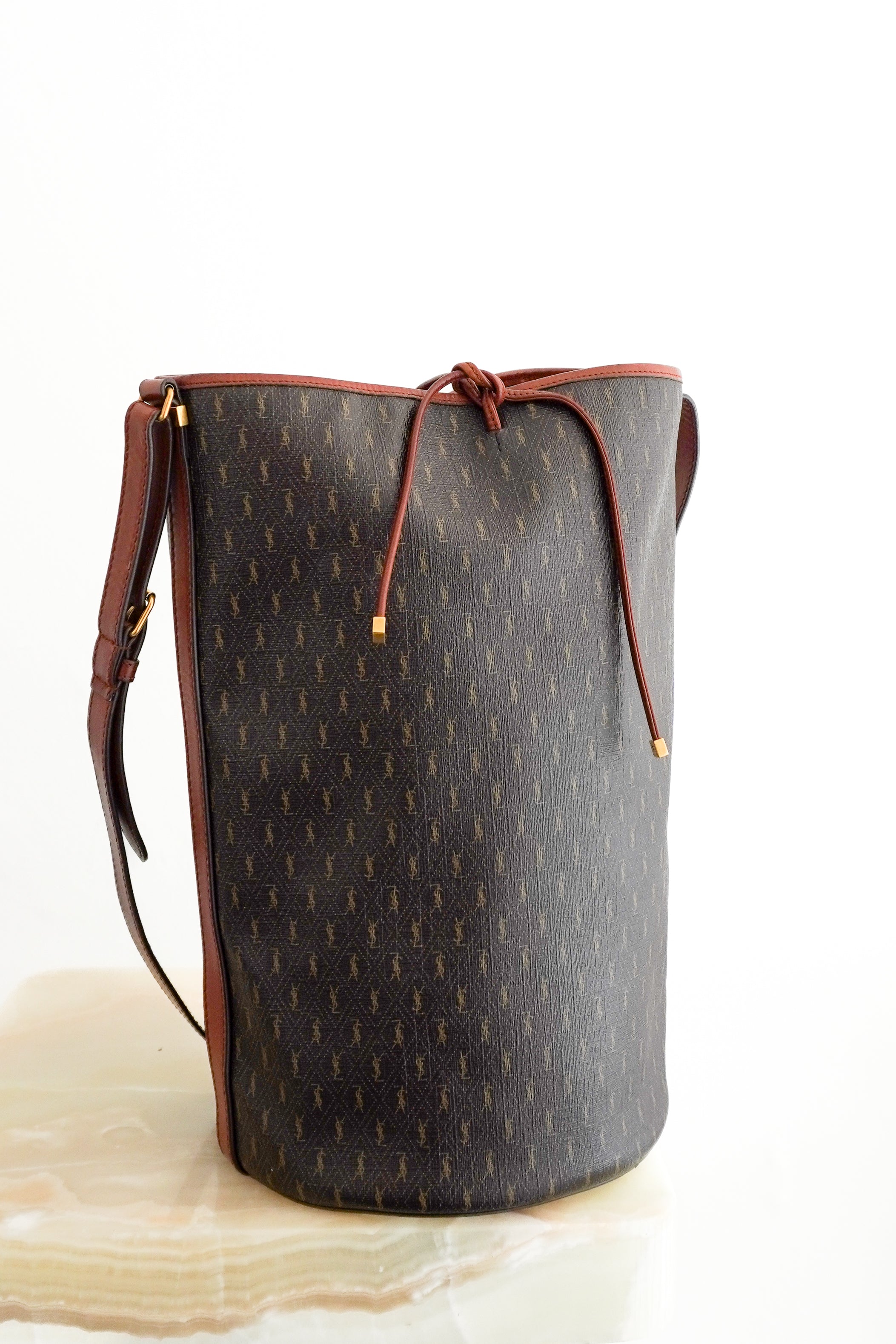 Saint Laurent Le Monogramme Bucket Bag in Brown Canvas front photo chelsea london