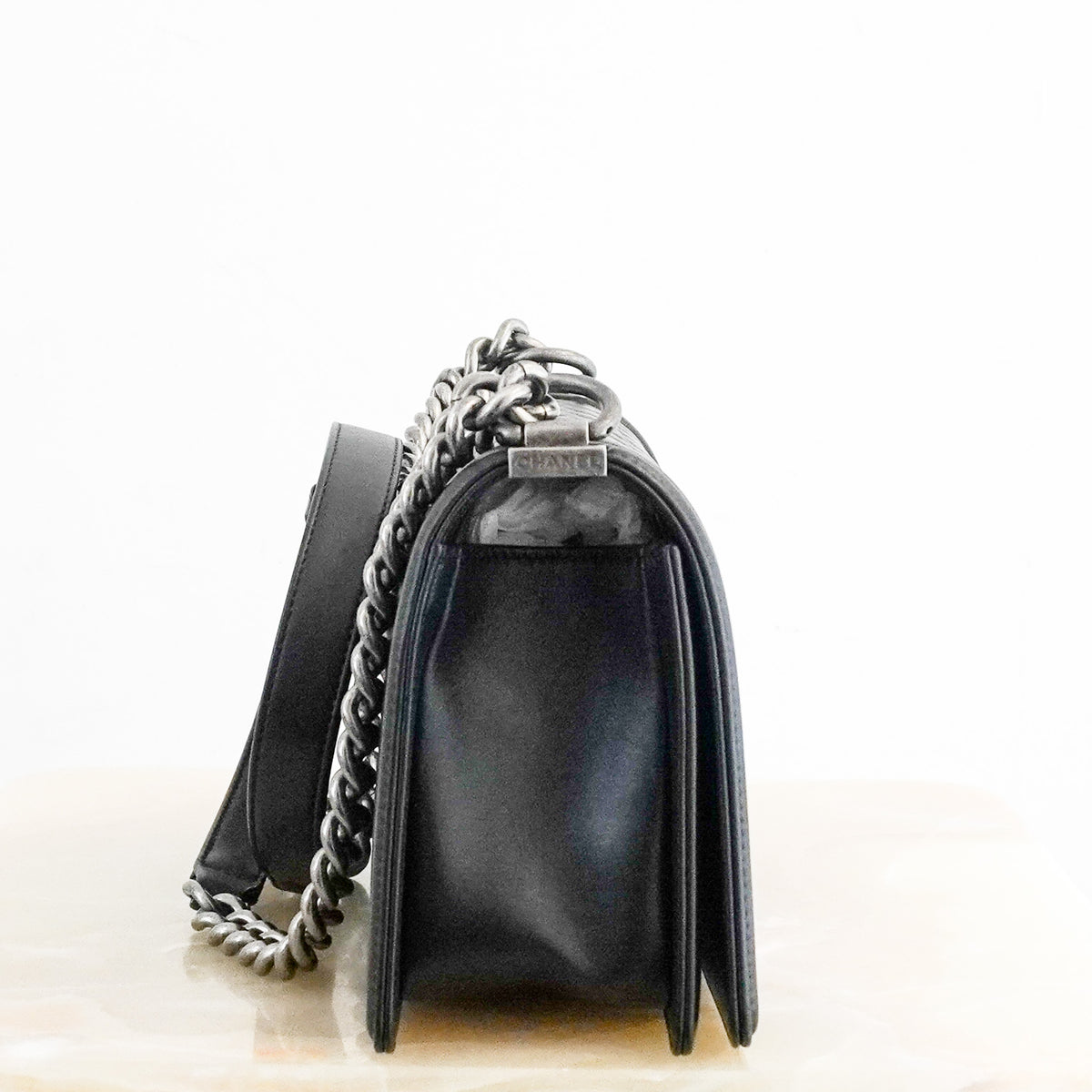 Side: Chanel Medium Boy Bag in Black Quilted Lambskin Leather