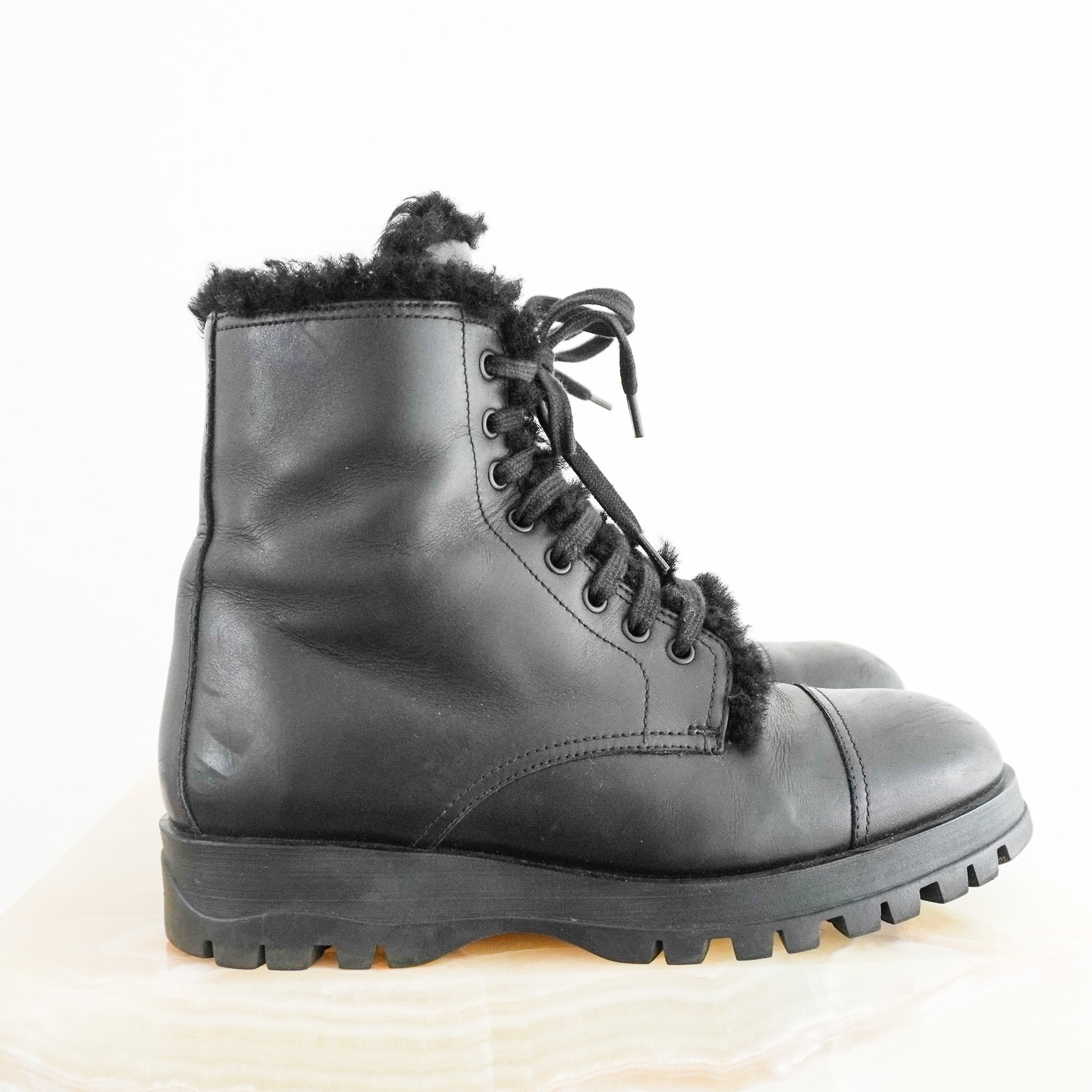Prada Brixxen Combat Leather Booties with Shearling Fur (RRP £1350) | Authentic Preloved - Reloved Again