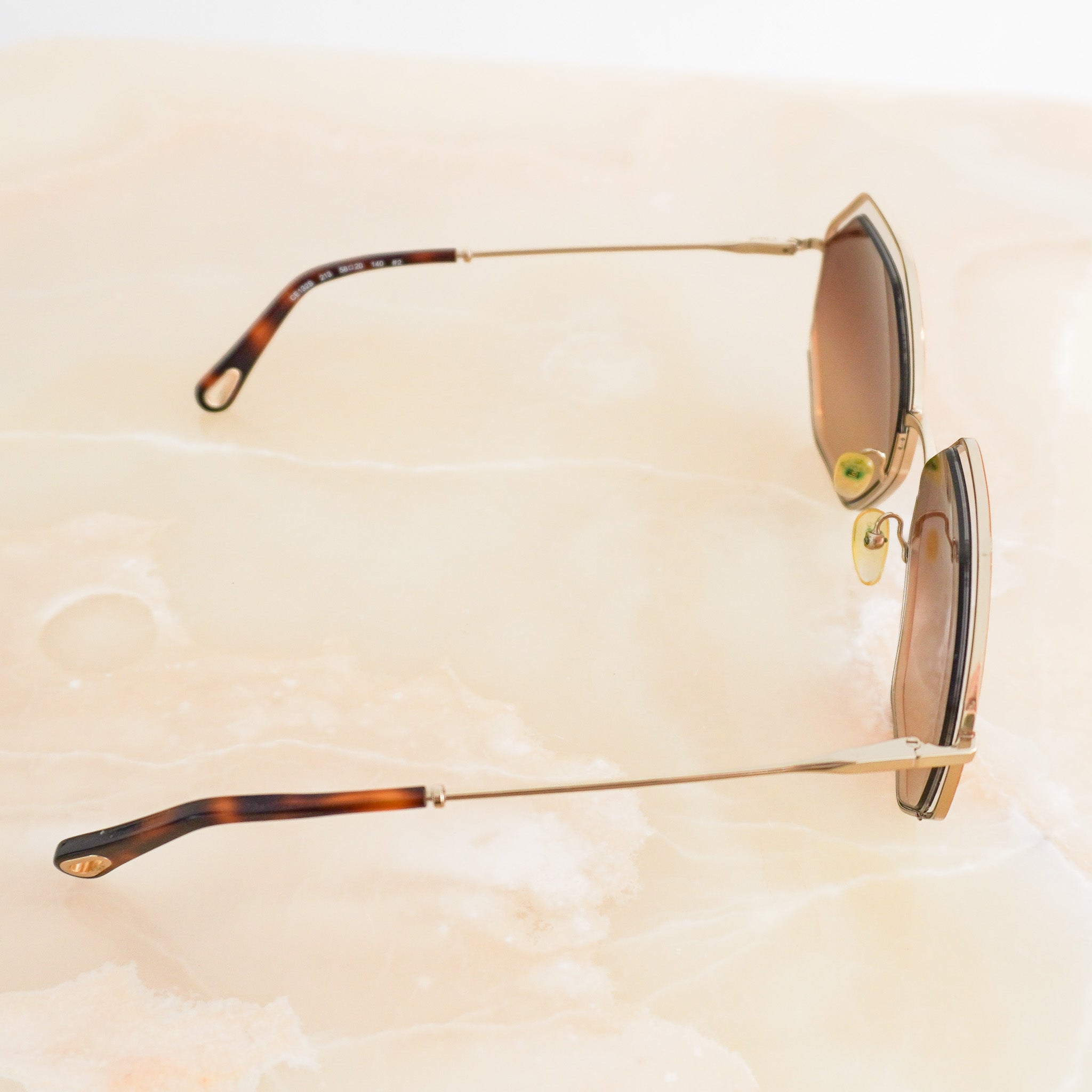 Side image of the Chloé Gold Poppy Octagonal Sunglasses
