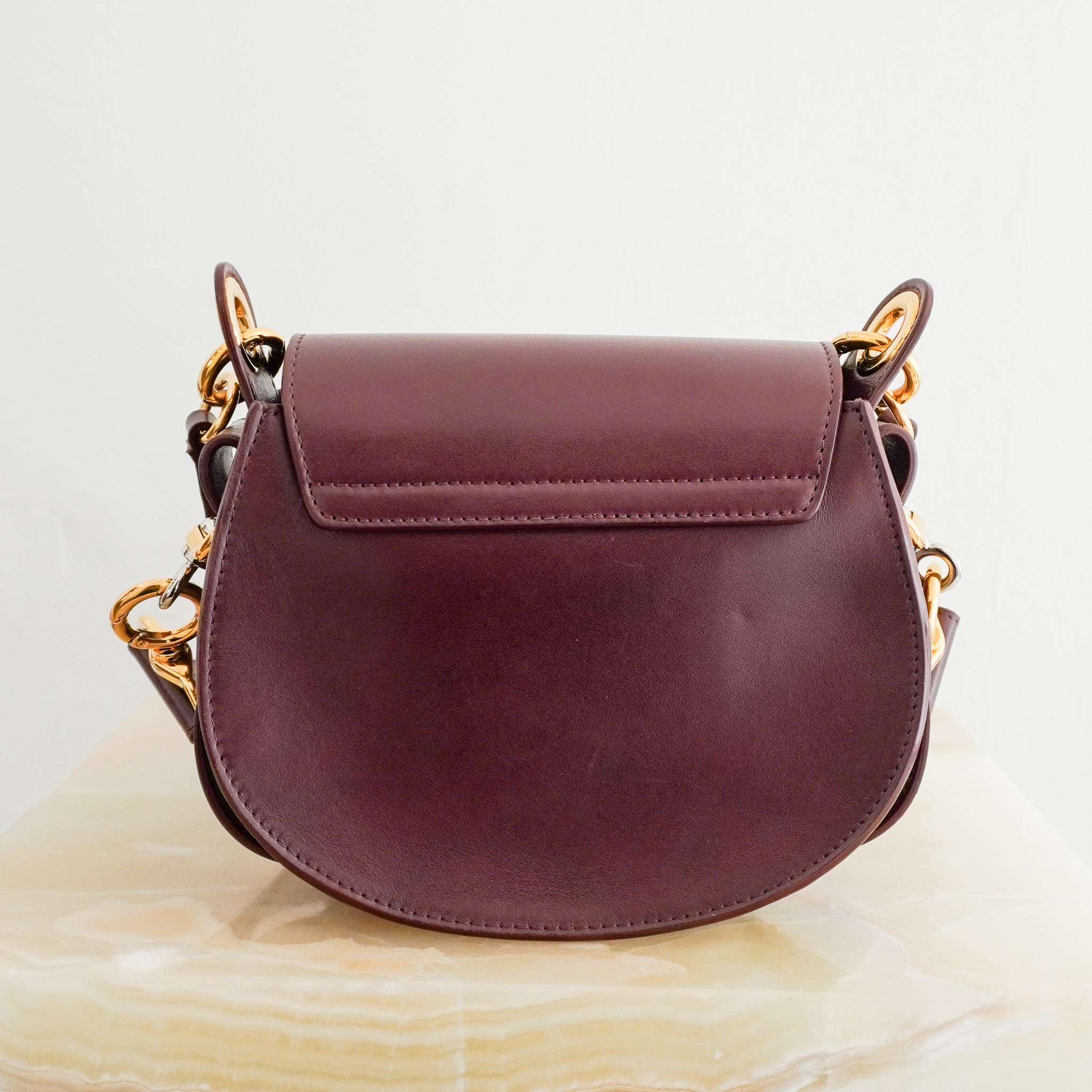 Side image of the Chloe Tess Bag in Burgundy