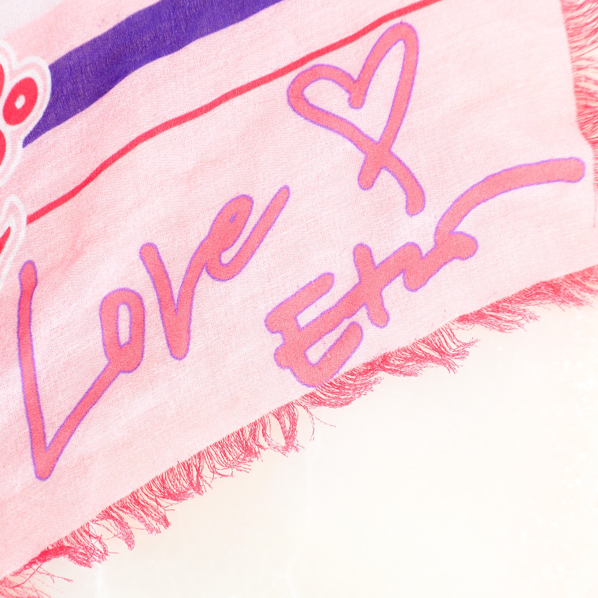 Side image of the Etro Pink Patterned Wool Scarf