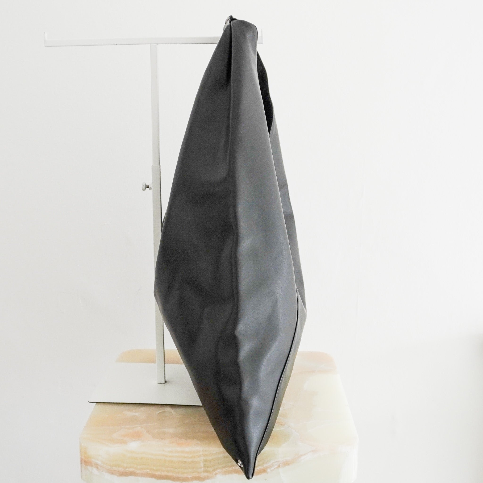 Side image of the Maison Margiela MM6 Black Bag