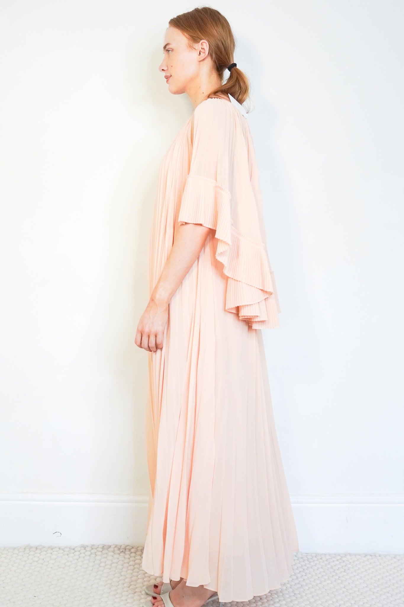 Side image of the NEW Zimmermann Illuminate Pleated Maxi Dress
