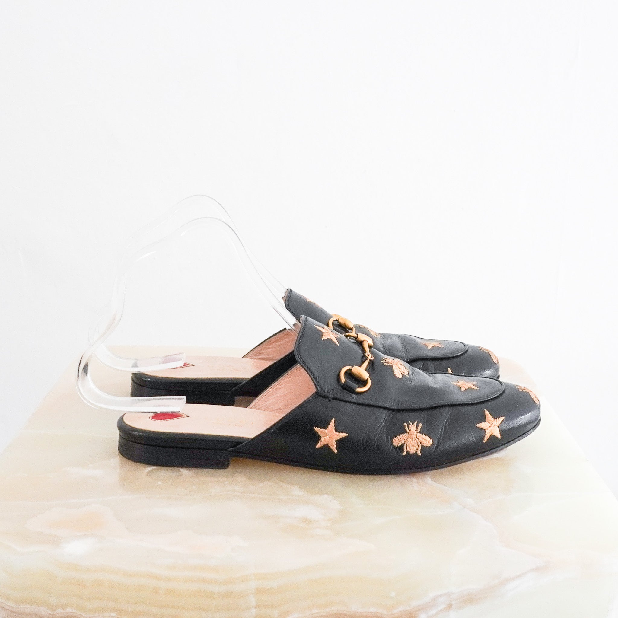 Side photo of the Gucci Bee Printowns Mules