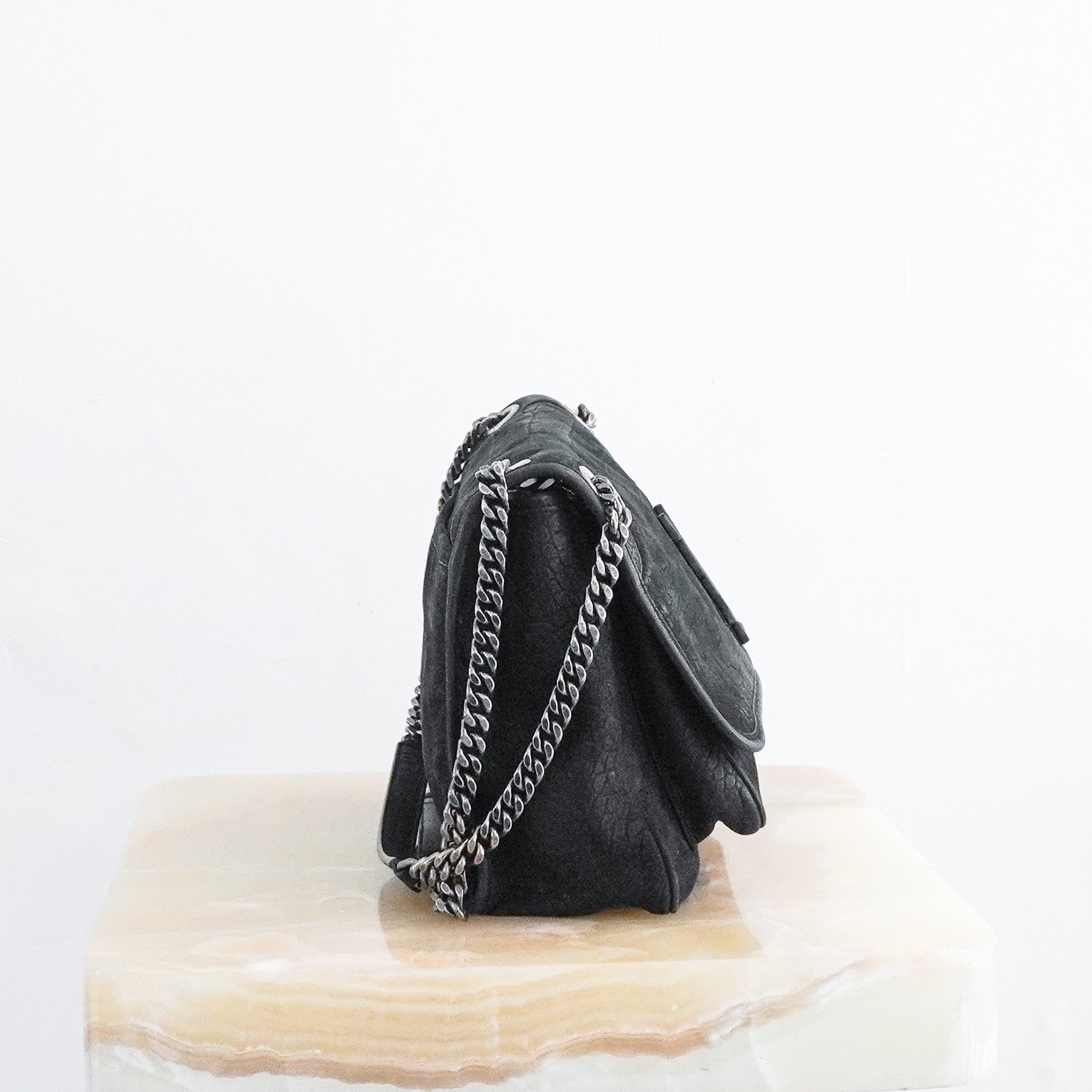 Side photo of the Saint Laurent Niki Shoulder Bag in Black Croc