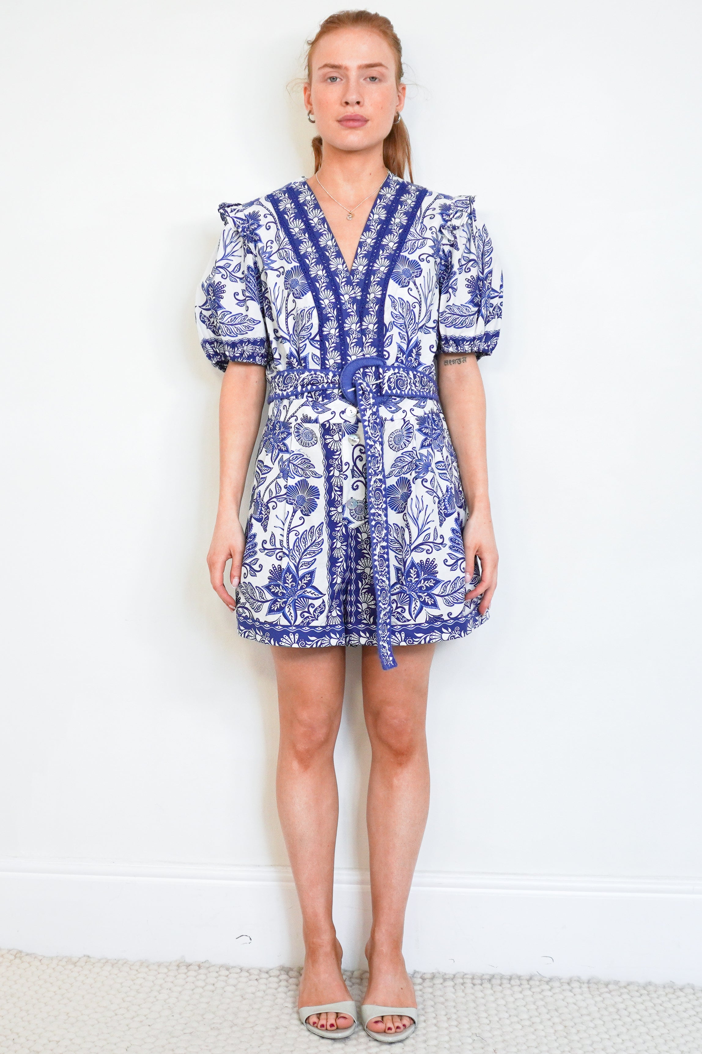 Front picture of the Farm Rio Playsuit, showing the neckline and the belt.