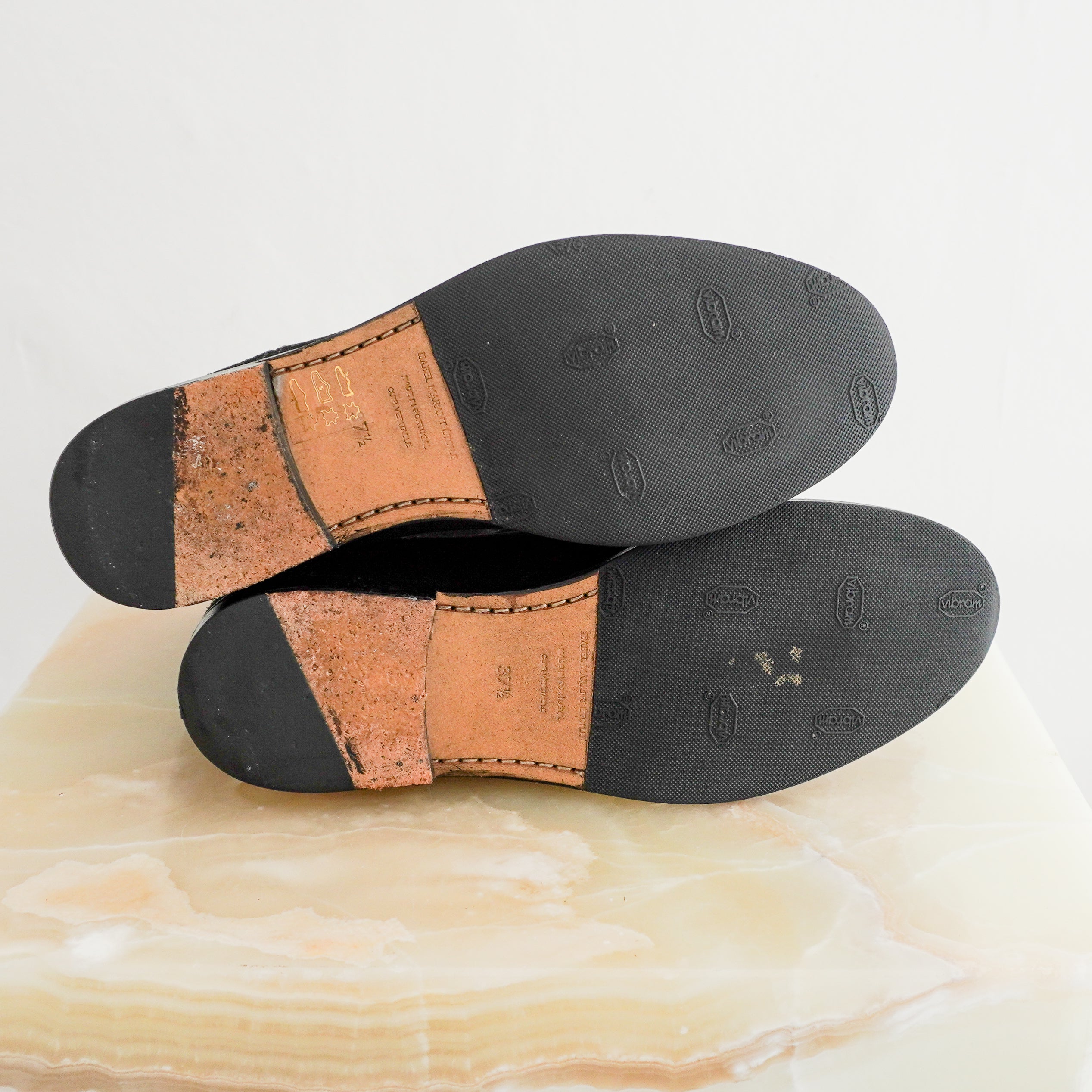 Base image of the Isabel Marant Etoile ankle boots showing the wear.
