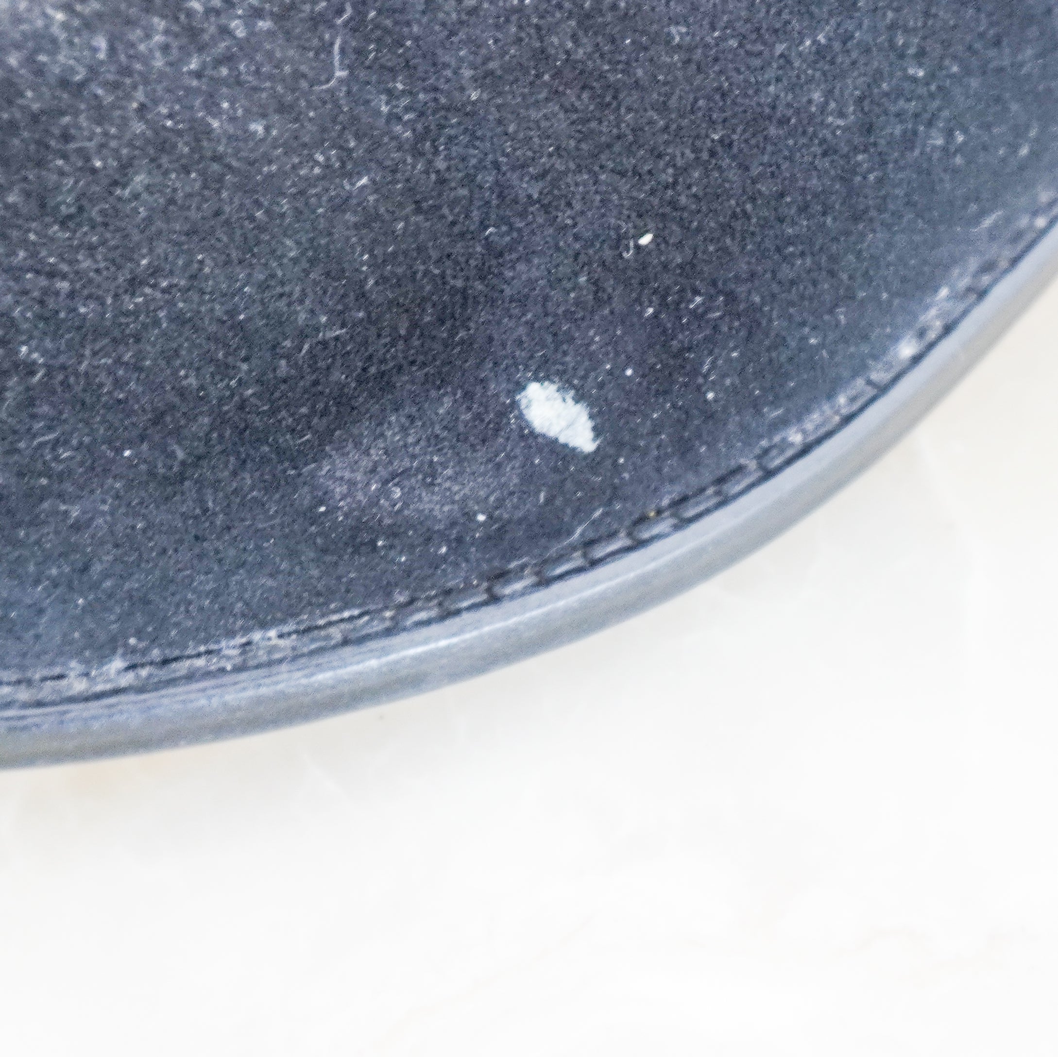 close up image of the Isabel Marant Etoile ankle boots showing the minor mark to the suede exterior.