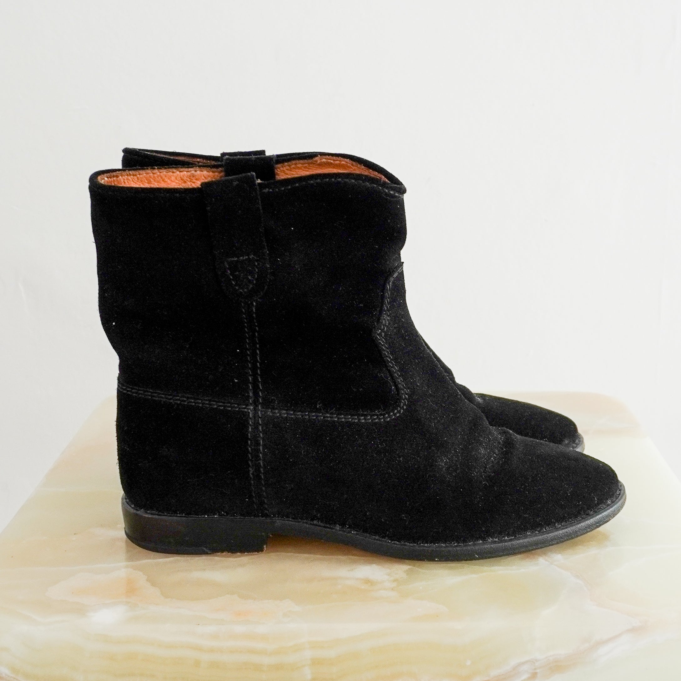 SIde image of the Isabel Marant Etoile ankle boots showing the suede exterior and stitching.