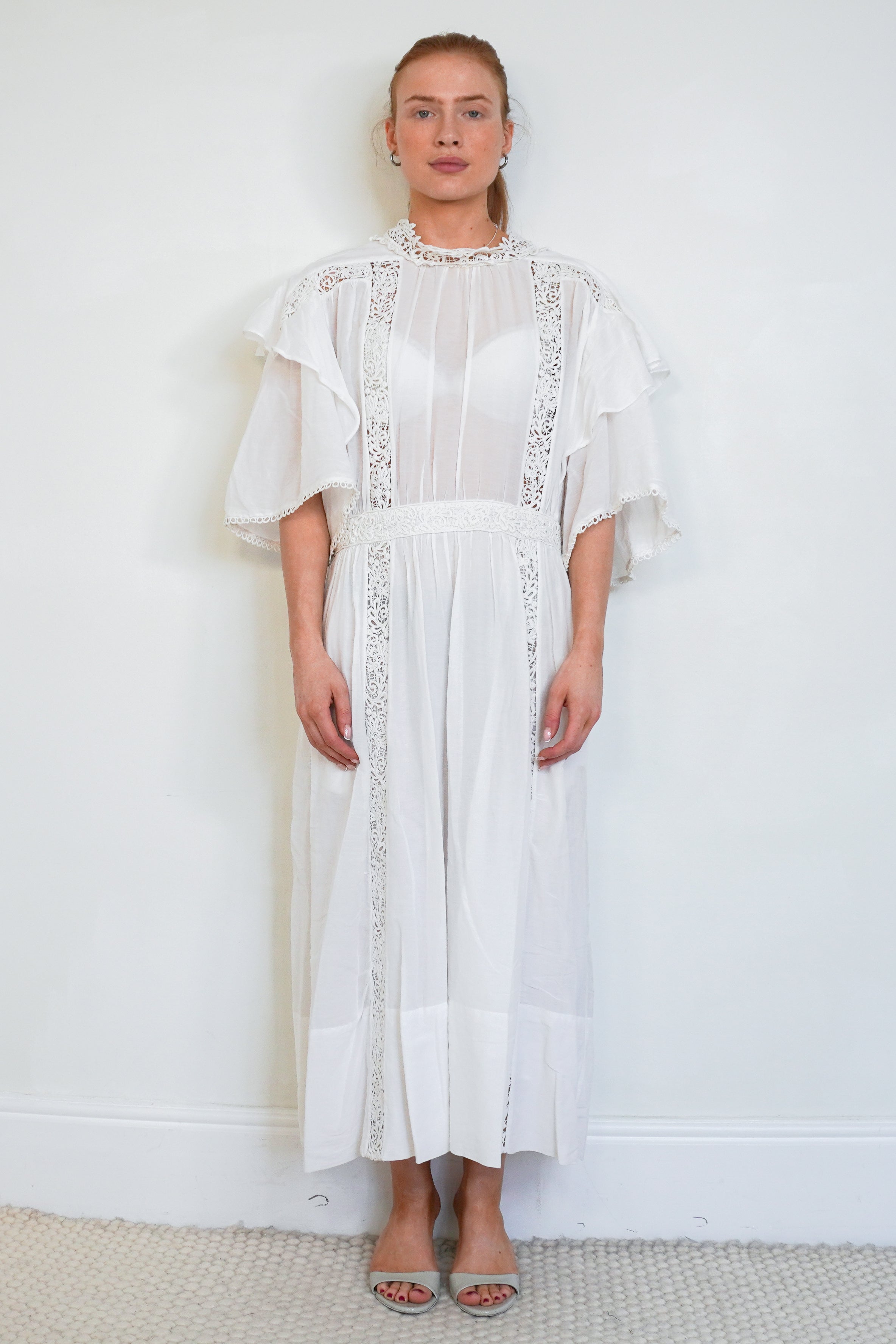 Front picture of Isabel Marant cotton dress, showing the lace broderie anglais details.