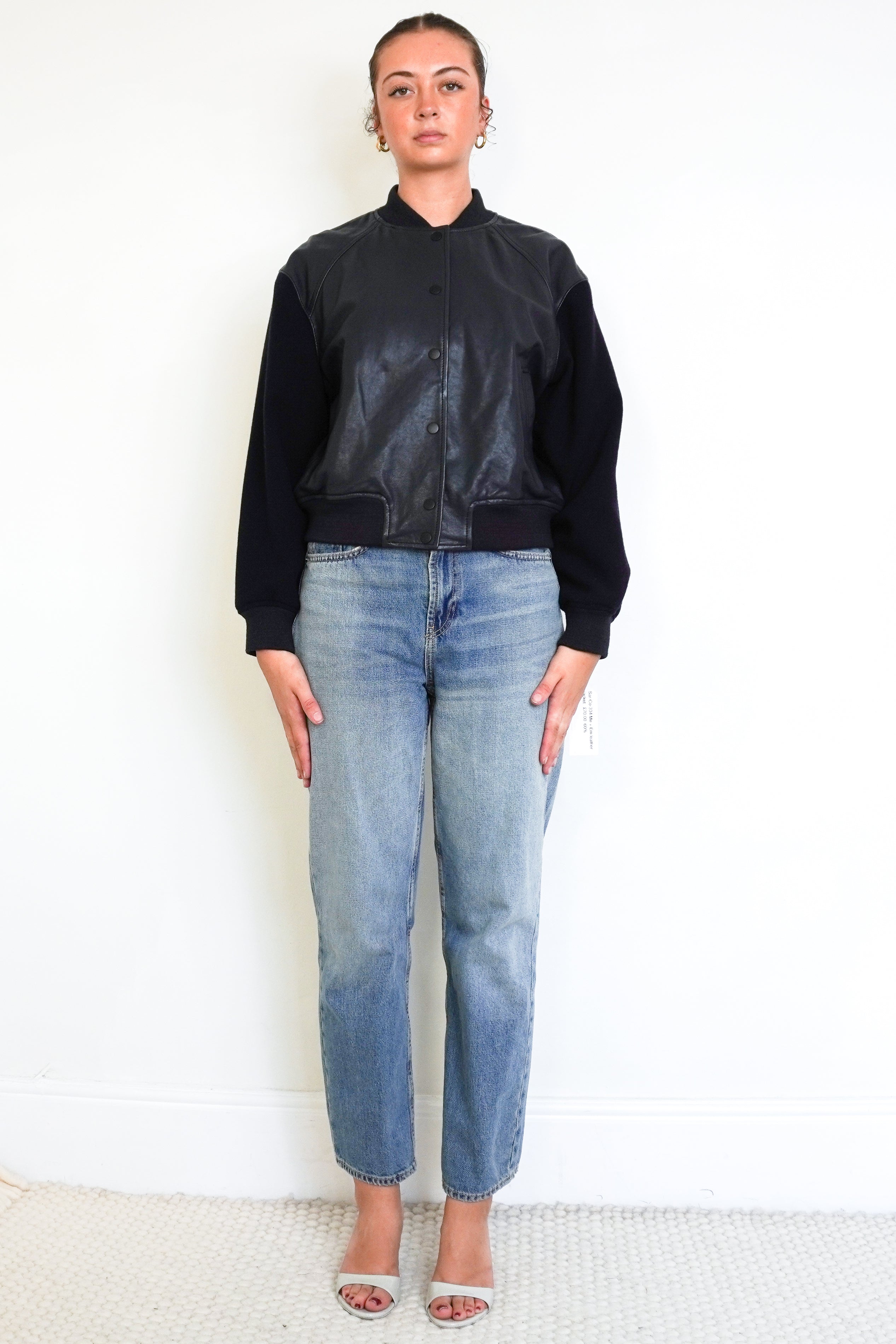 Front image of the ME+EM bomber jacket showing the fastening.