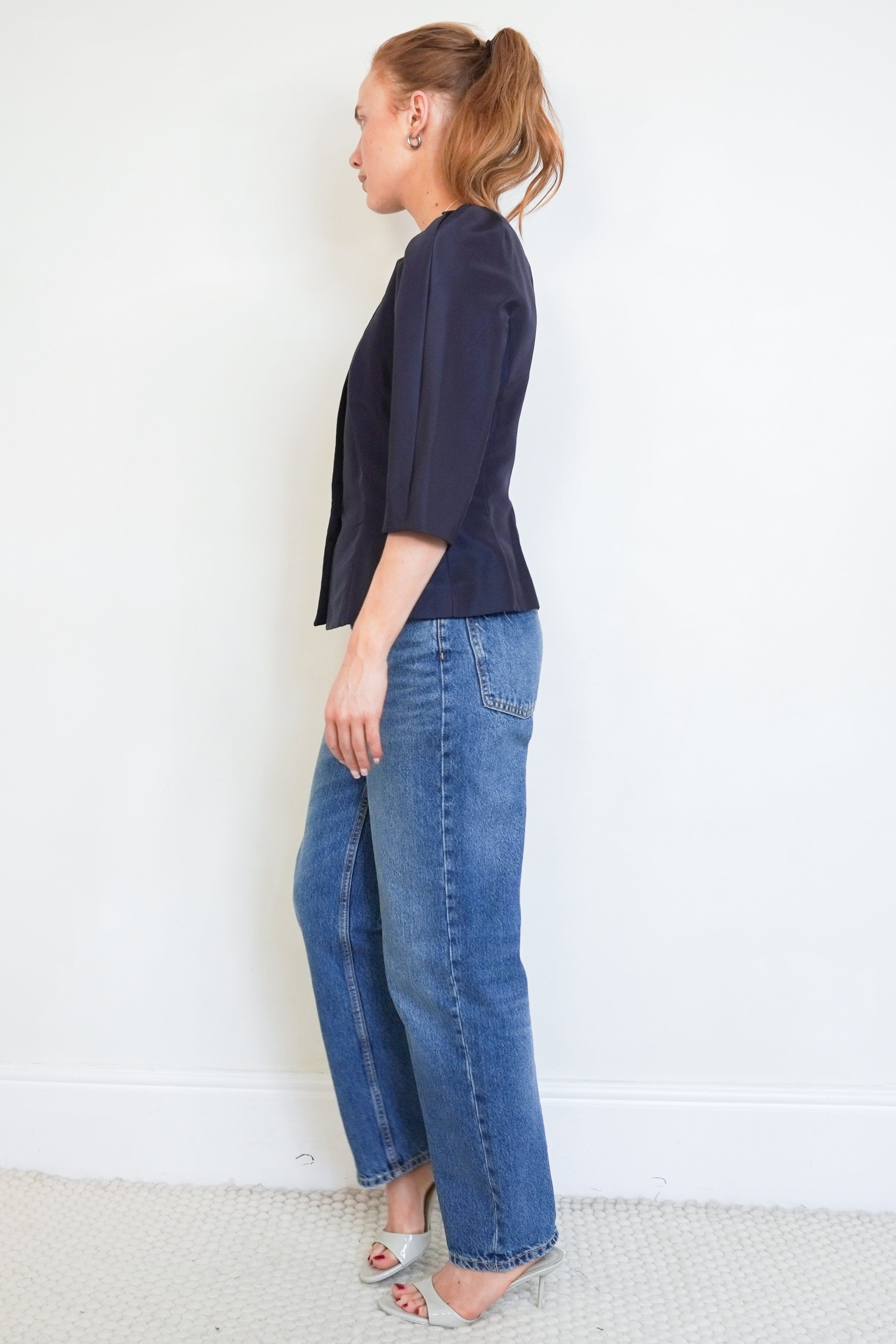 Side picture of the Oscar De La Renta Top showing the sleeves.
