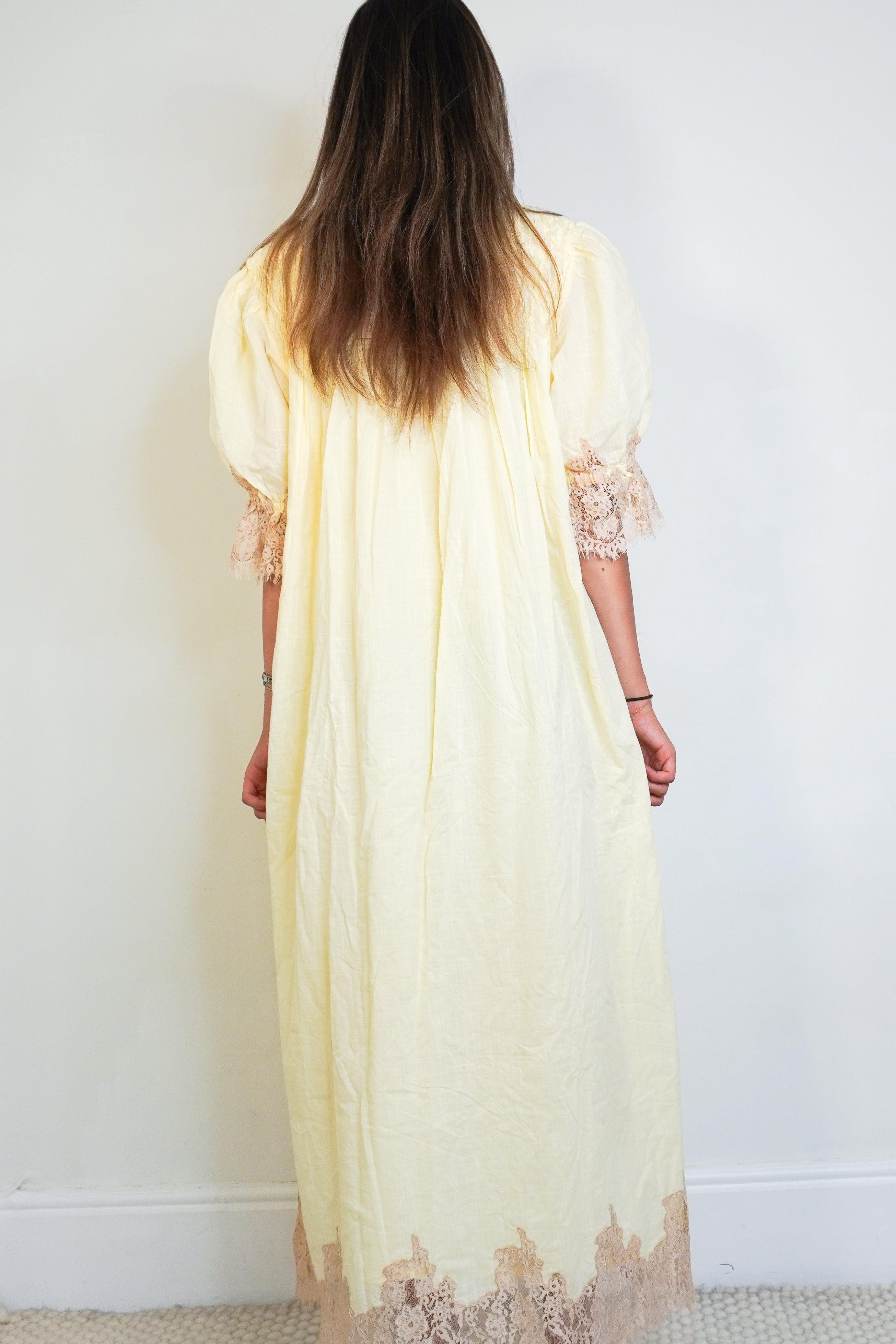 Back image of the Rixo Lorela dress showing the length.