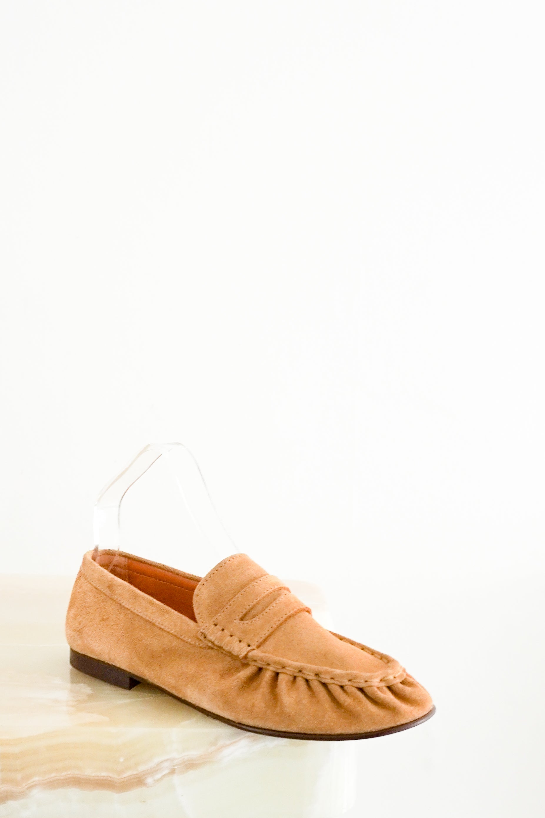 Front image of the Sezane loafers showing the colours.