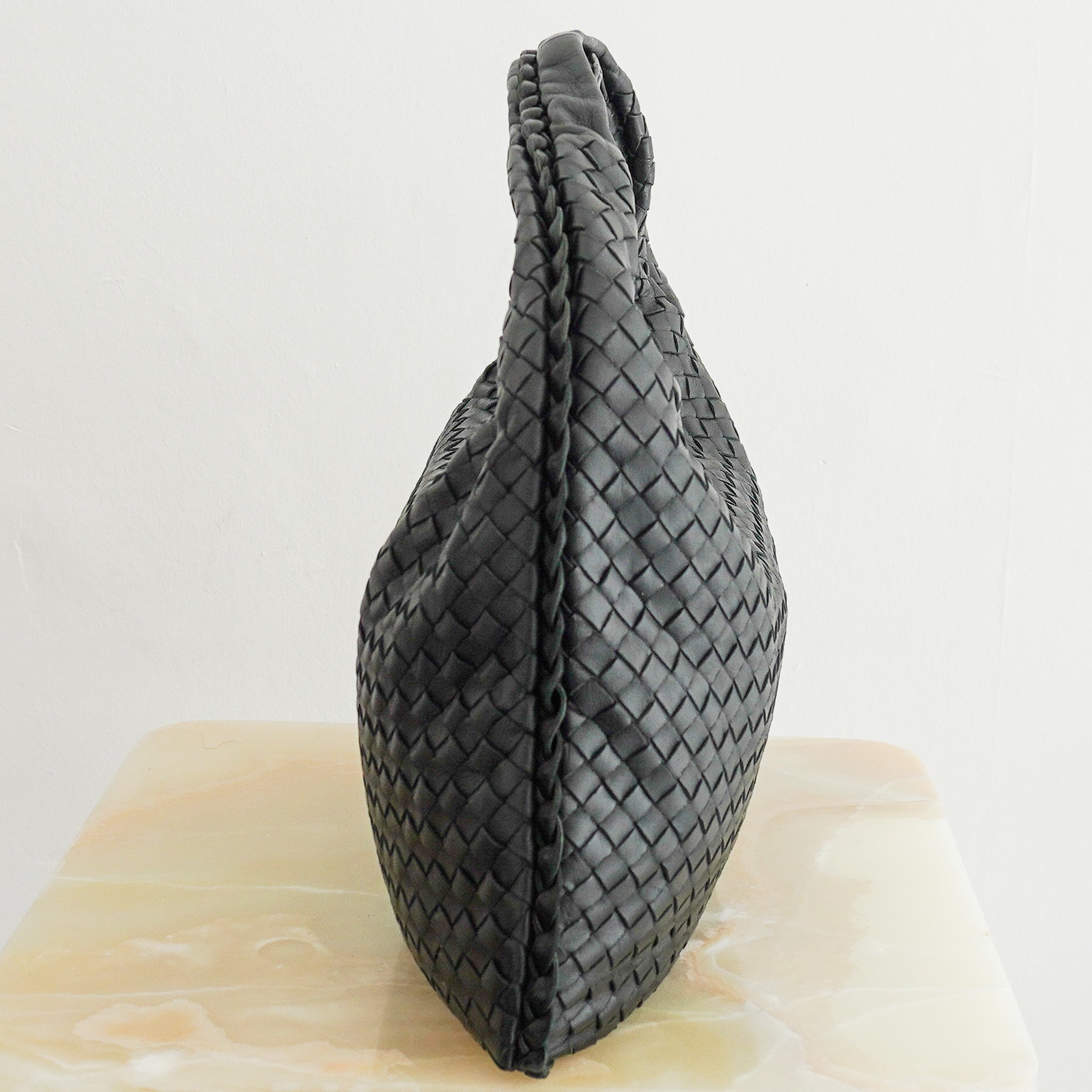 side image of the Bottega Veneta Intrecciato Black Leather Hobo Bag