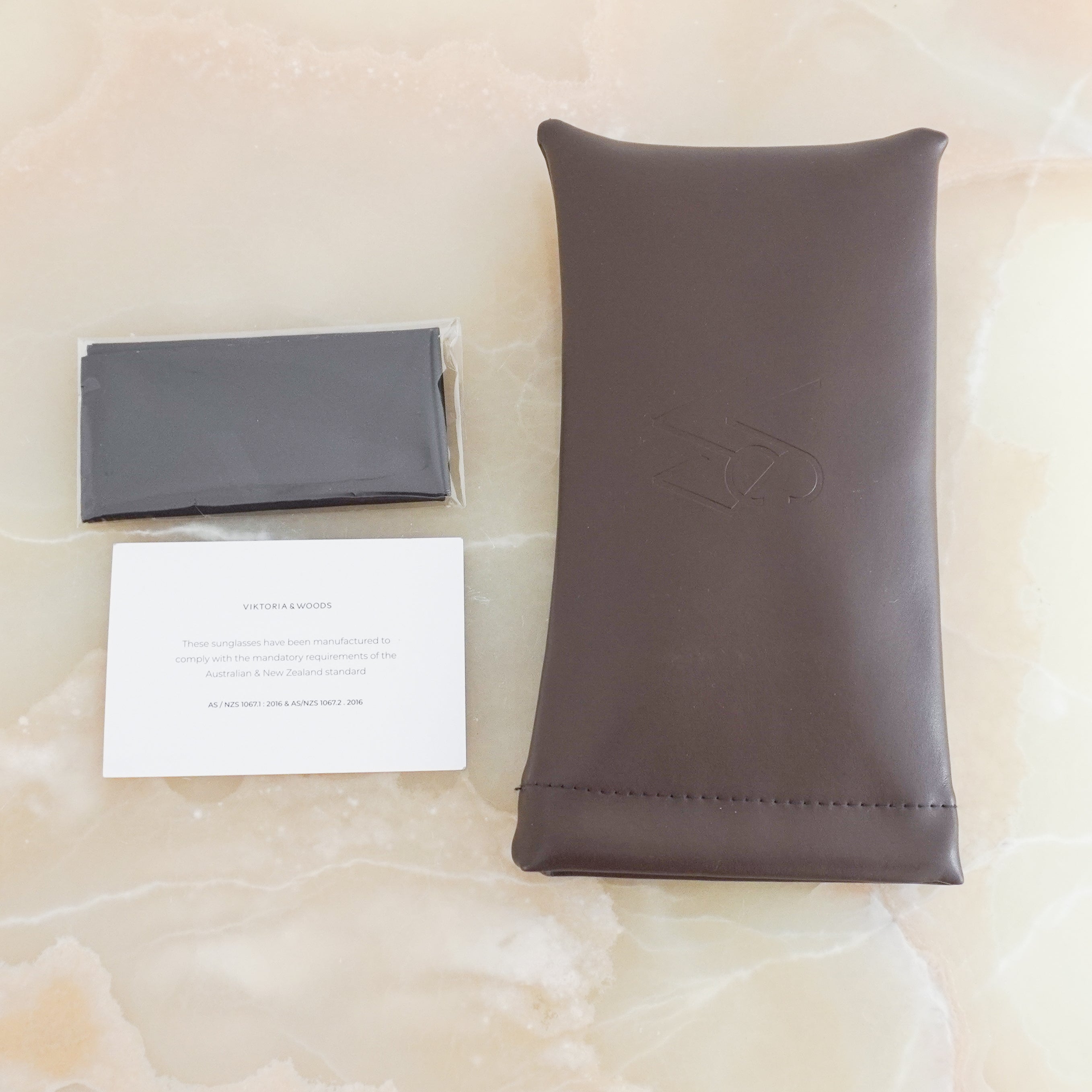 Soft Case and cloth picture of the Viktoria & Woods Sunglasses.