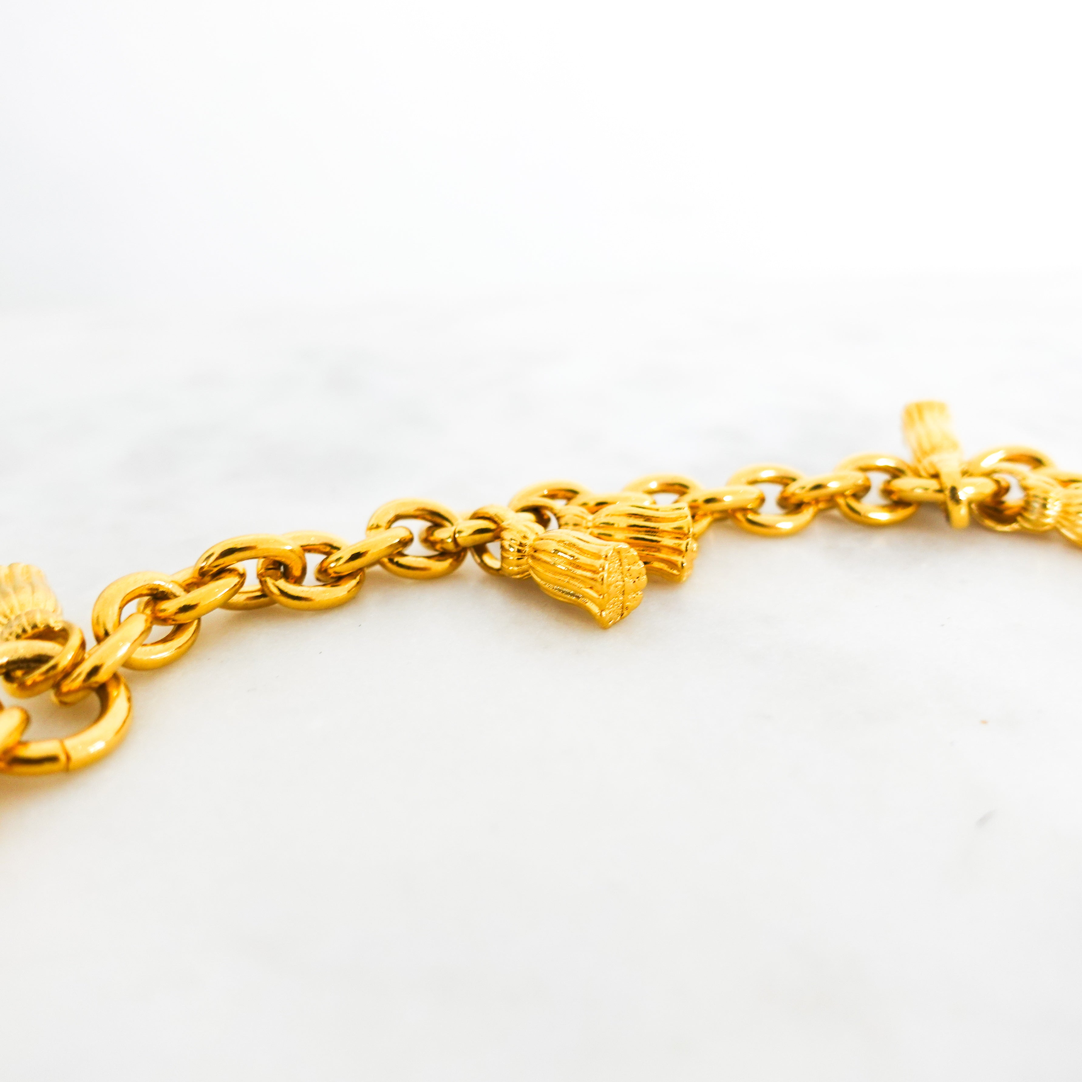 Gold plated necklace with tassles