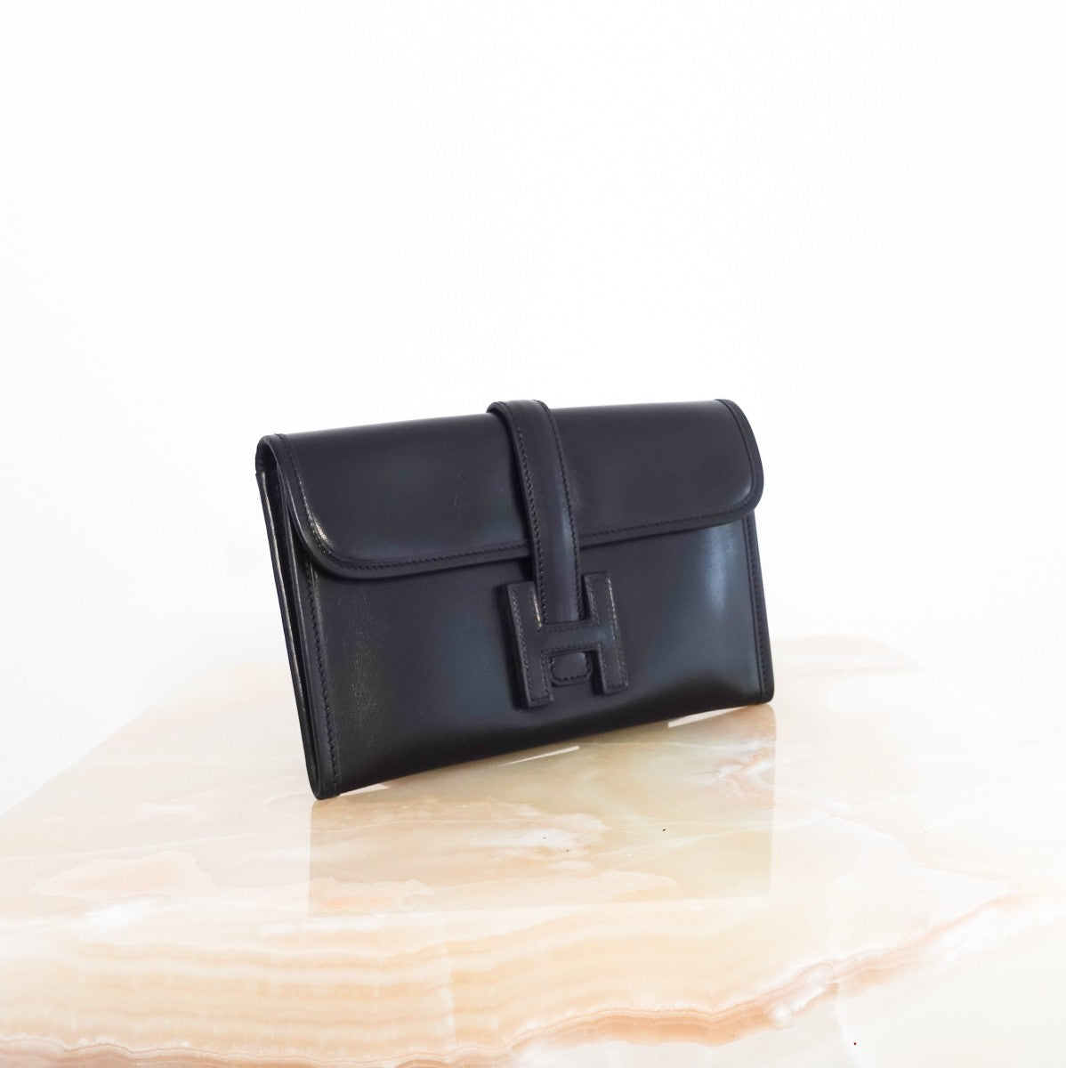 Jige black leather mini clutch