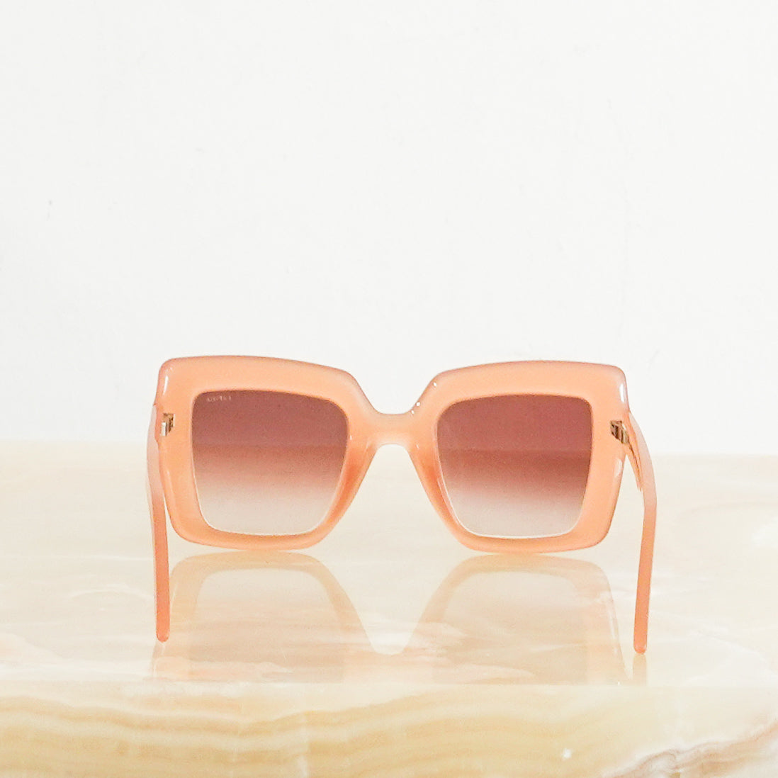 Peach sunglasses RRP £150