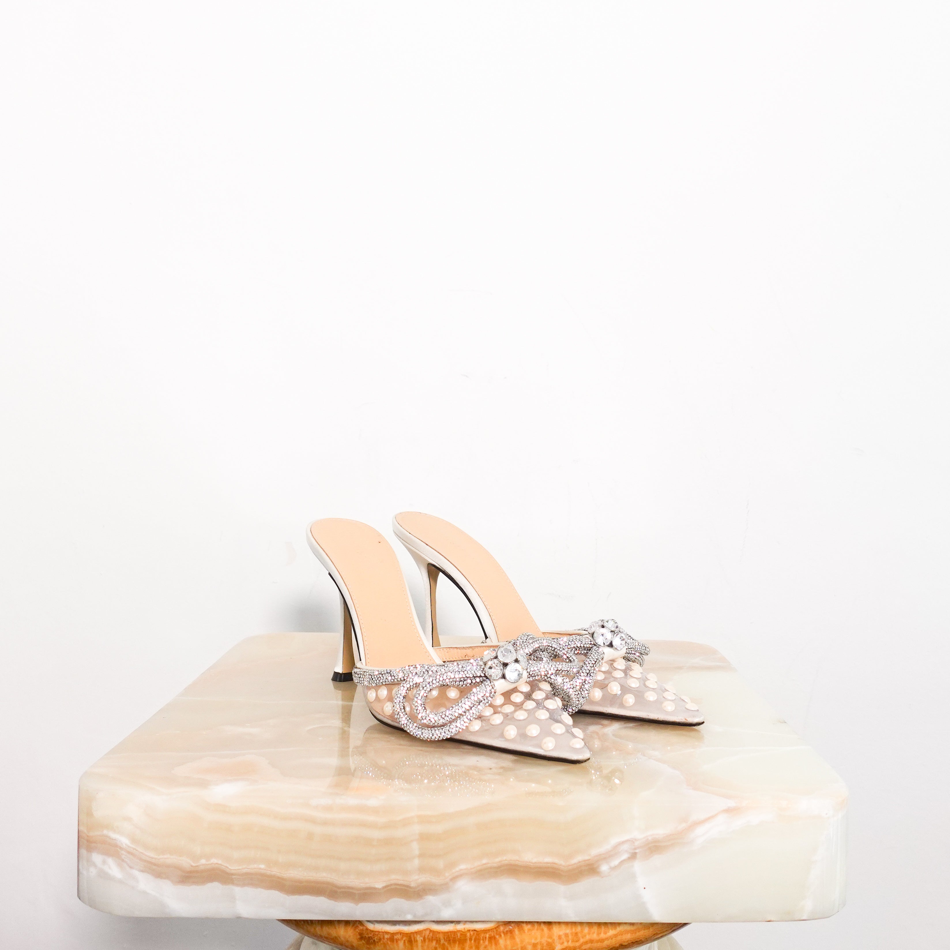 Heeled pearl and bow mules RRP £775