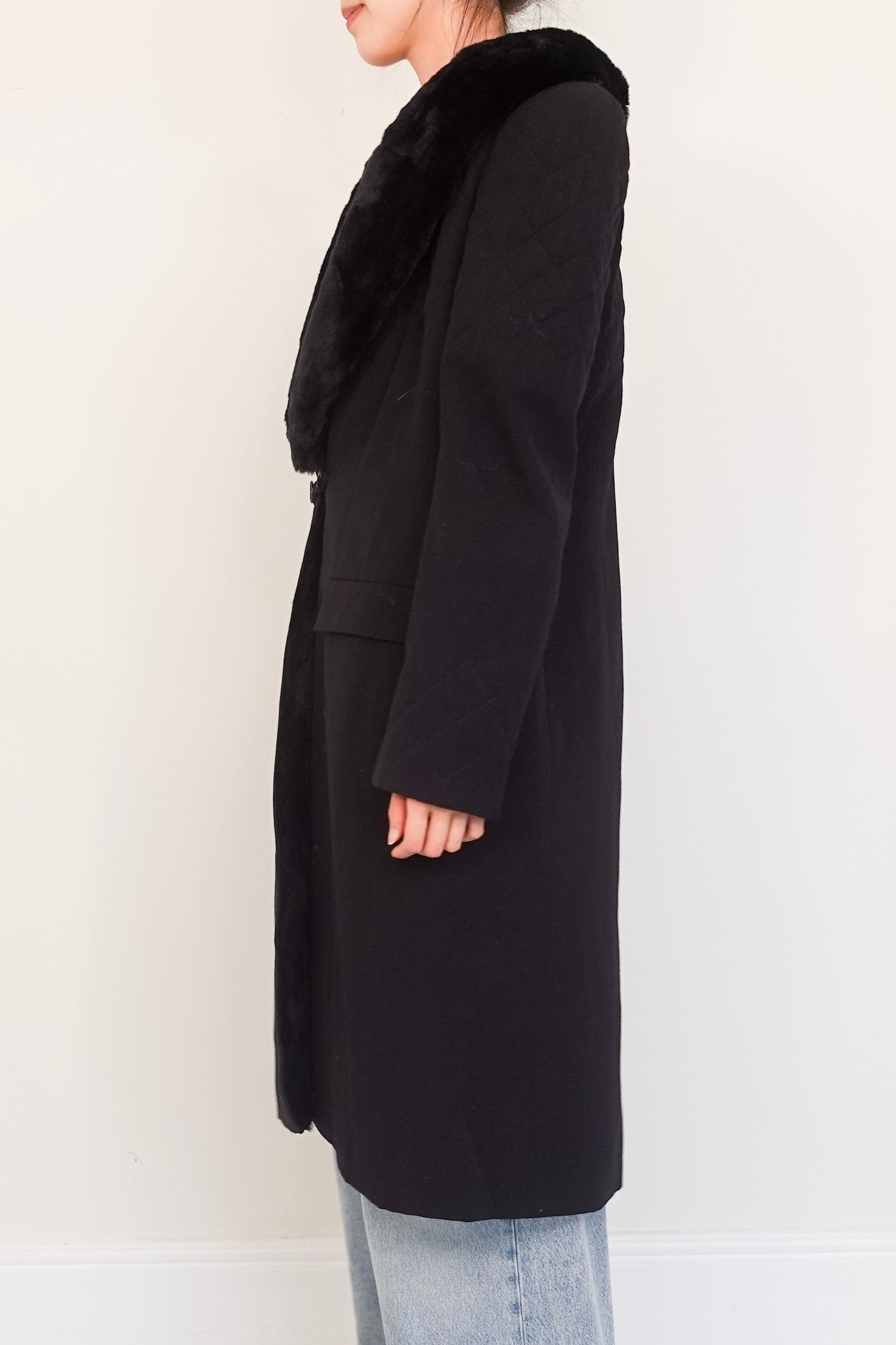 black wool coat with fur appliqué