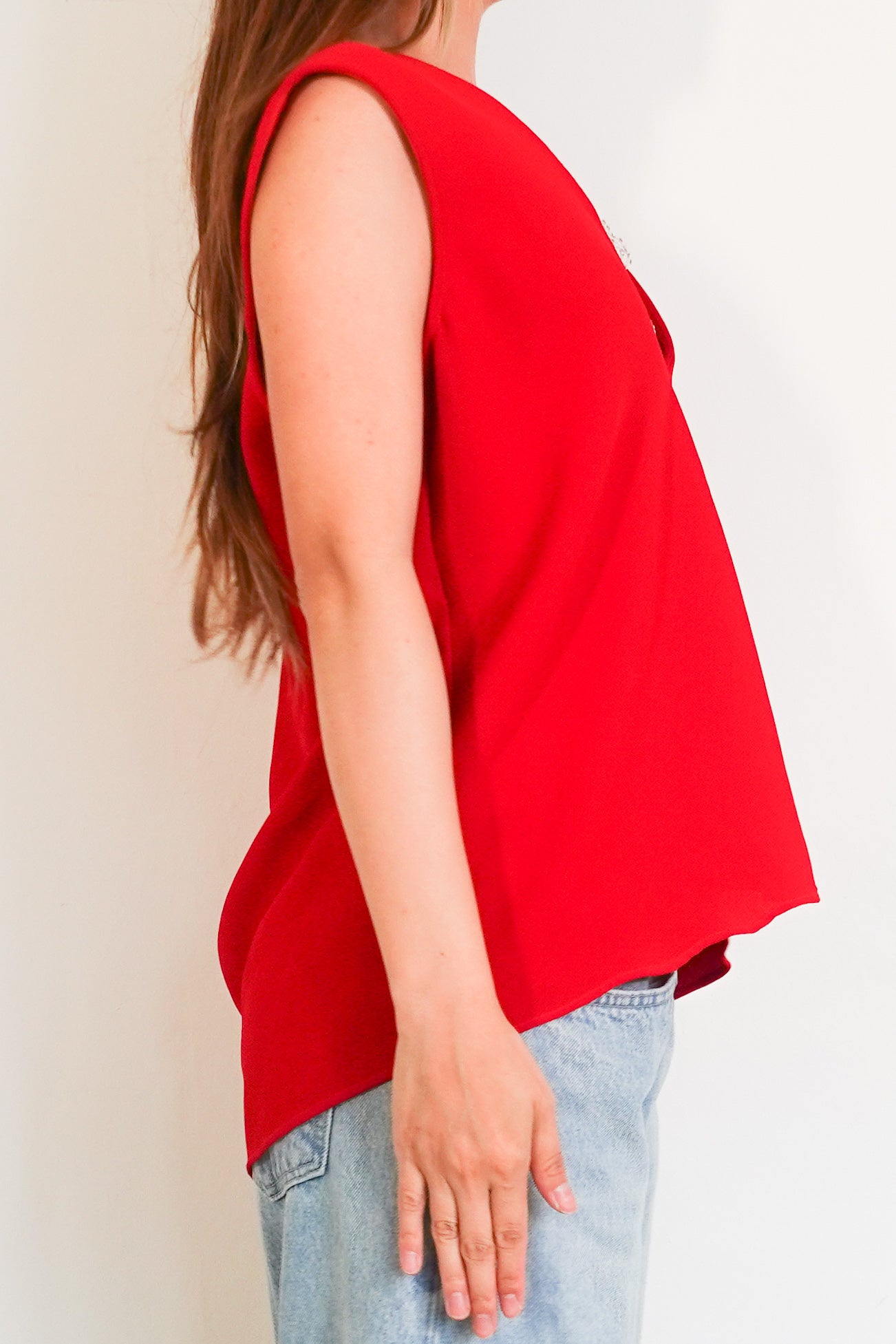 Red sleeveless top with crystal mesh appliqué