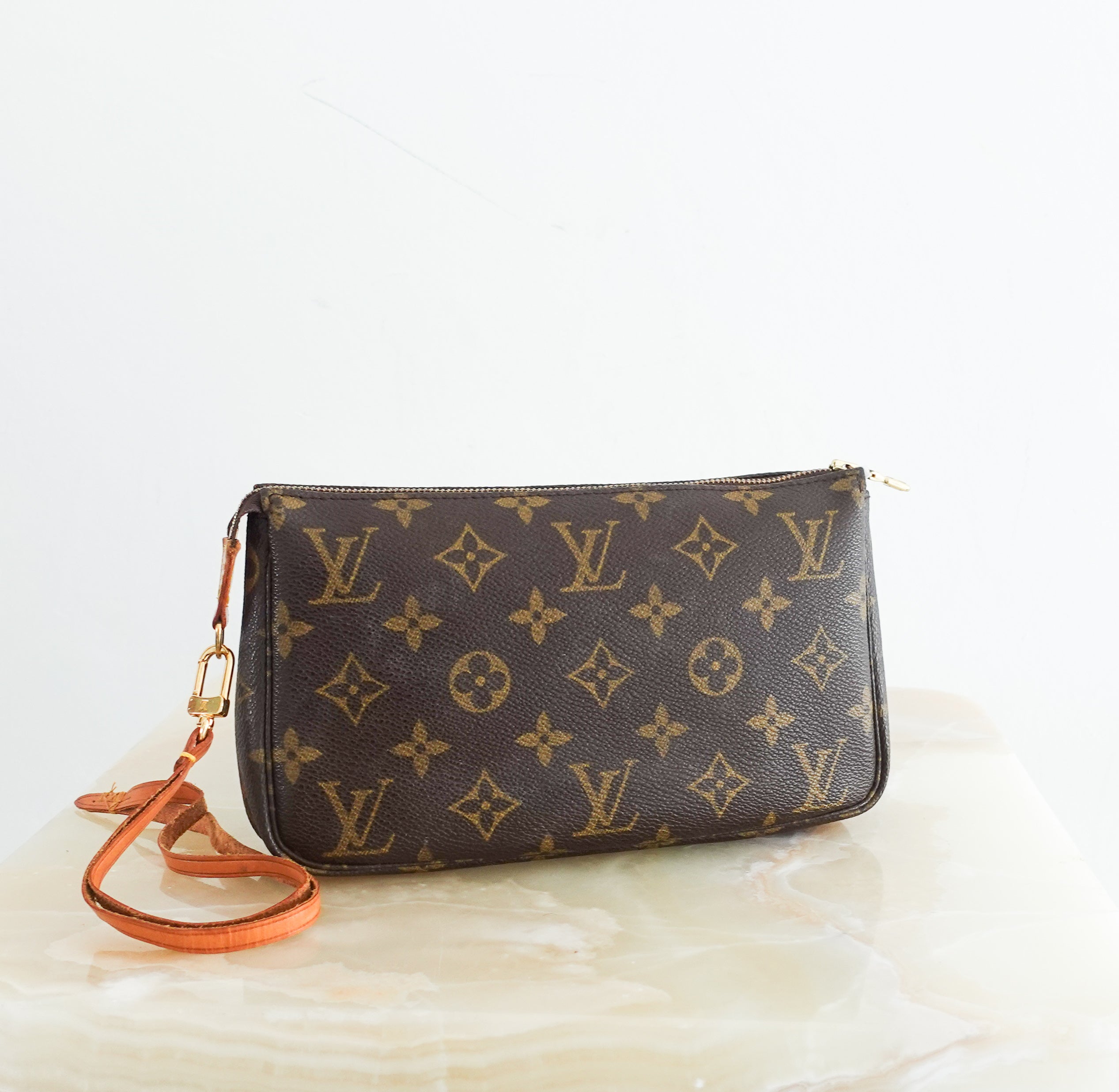 Monogram coated canvas clutch pouchette