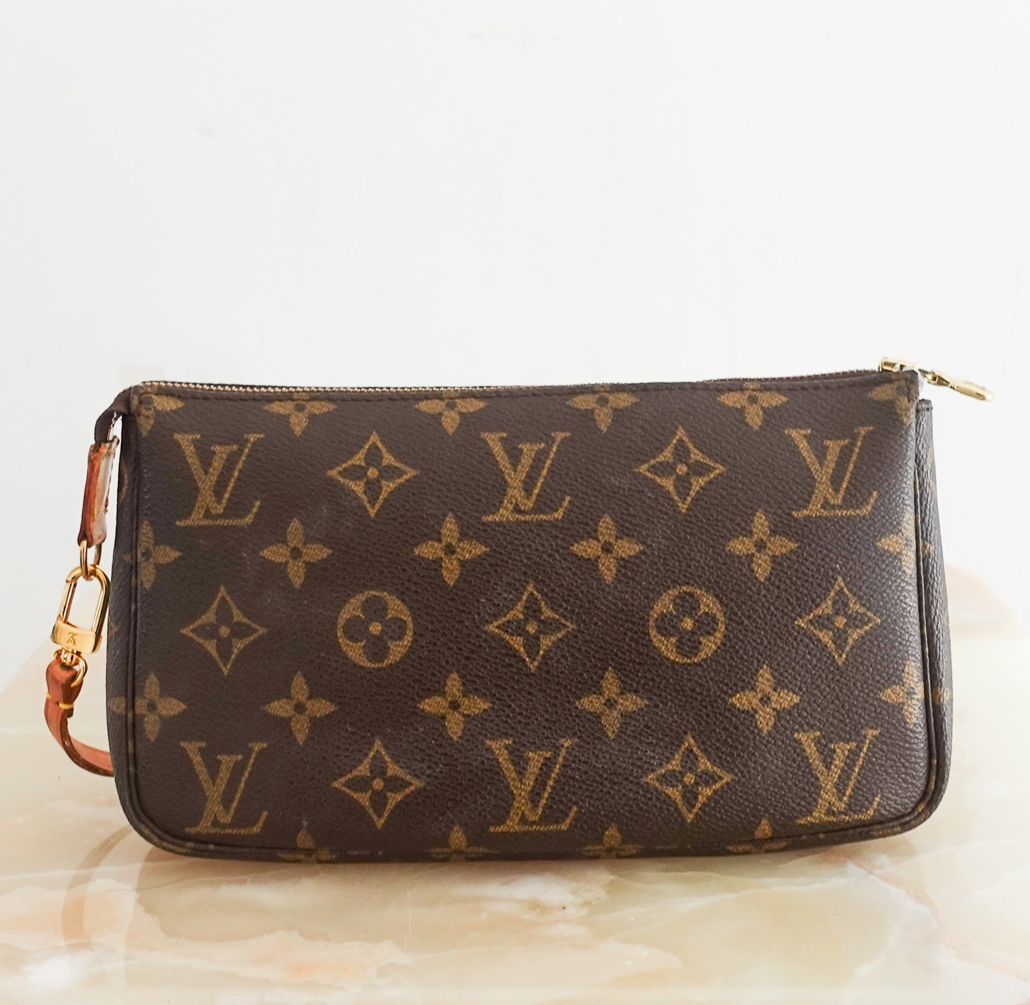 Monogram coated canvas clutch pouchette