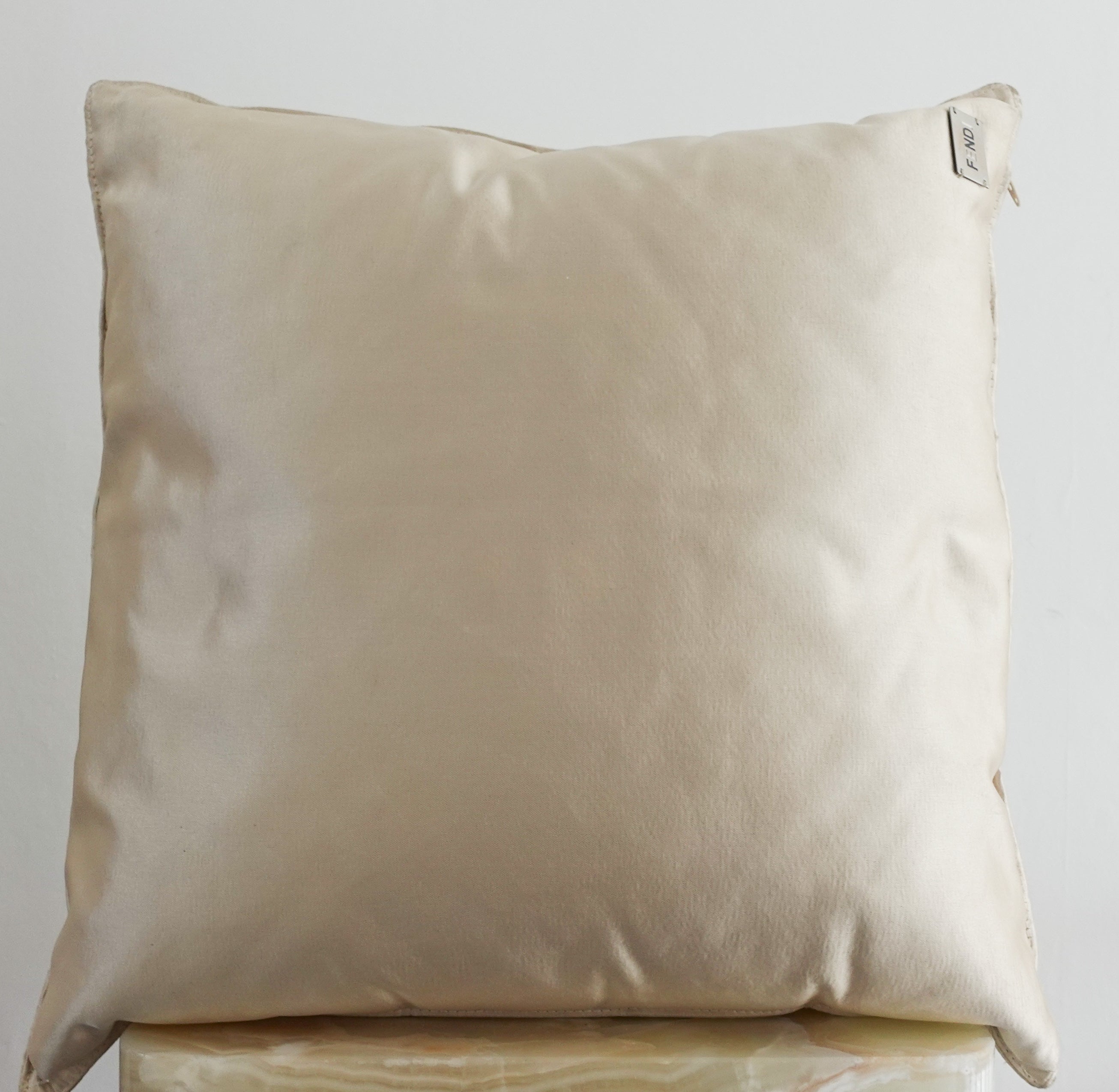 Cream cushion RRP £340