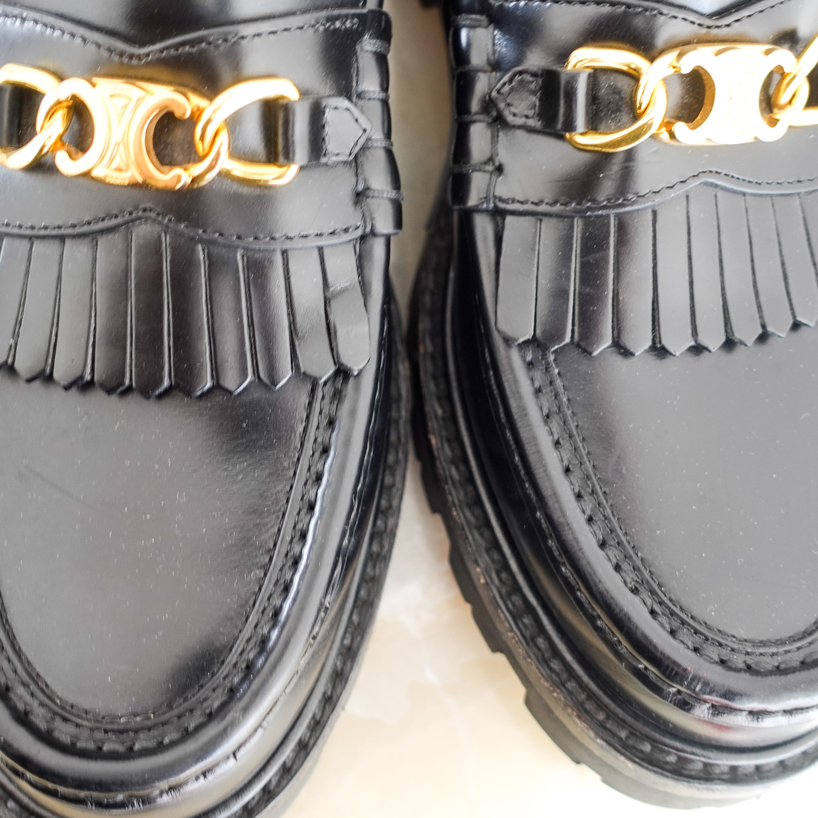 Black leather loafers RRP £850