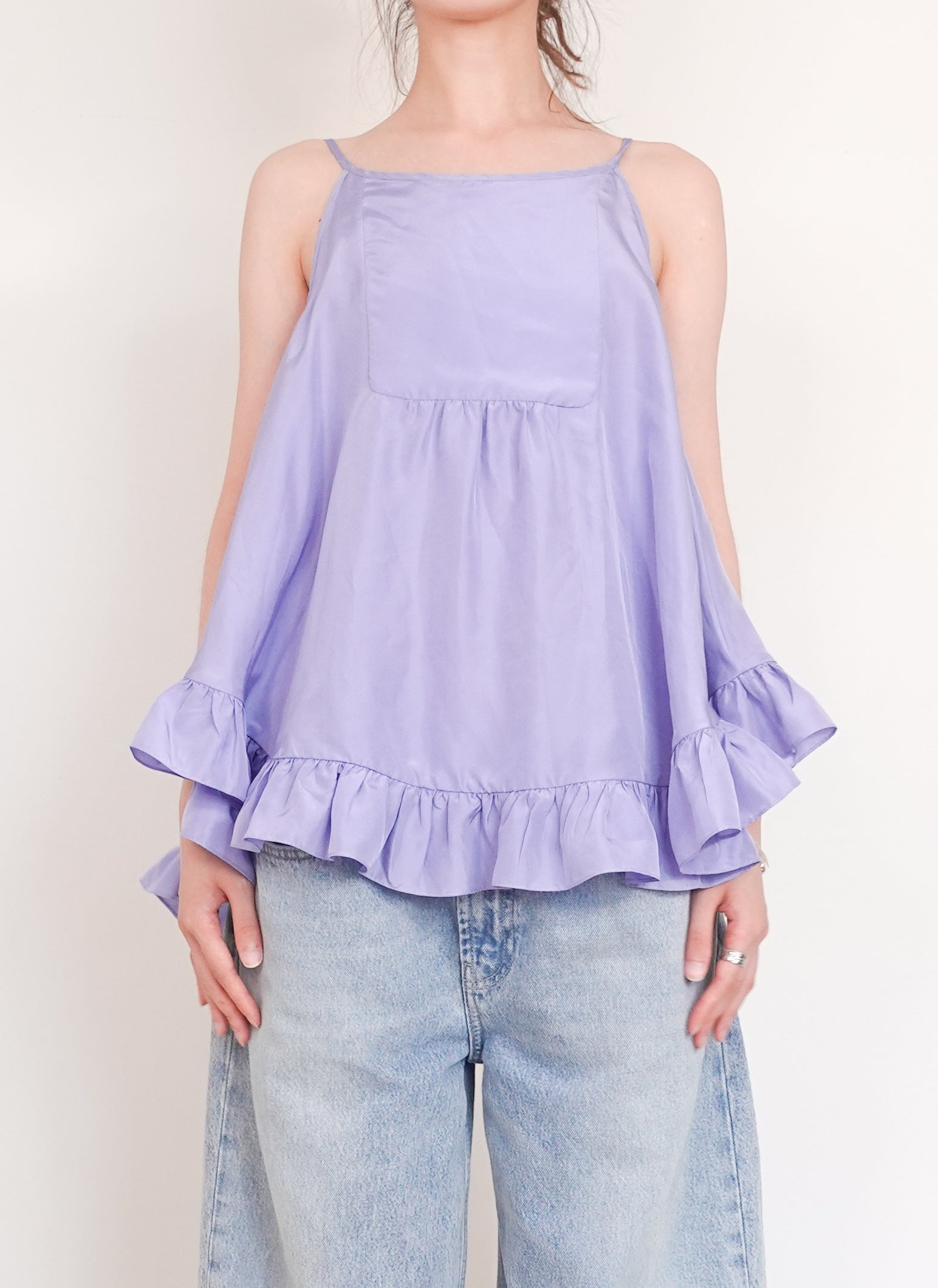 Purple sleeveless silk blouse