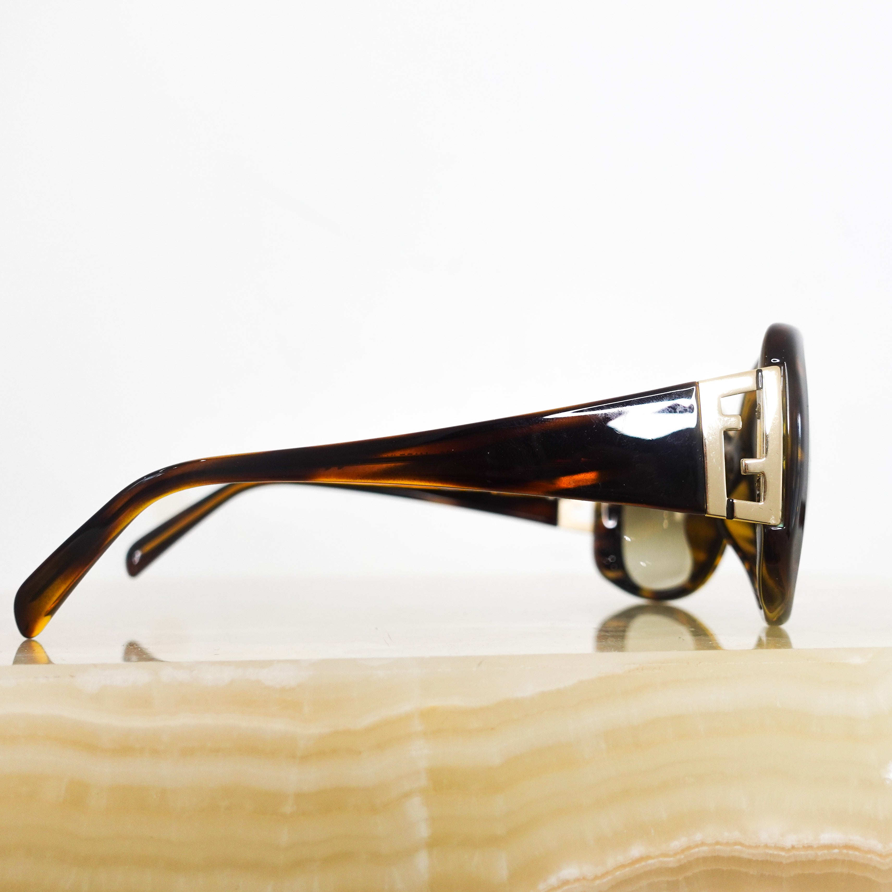 Brown tortoiseshell glasses RRP £290