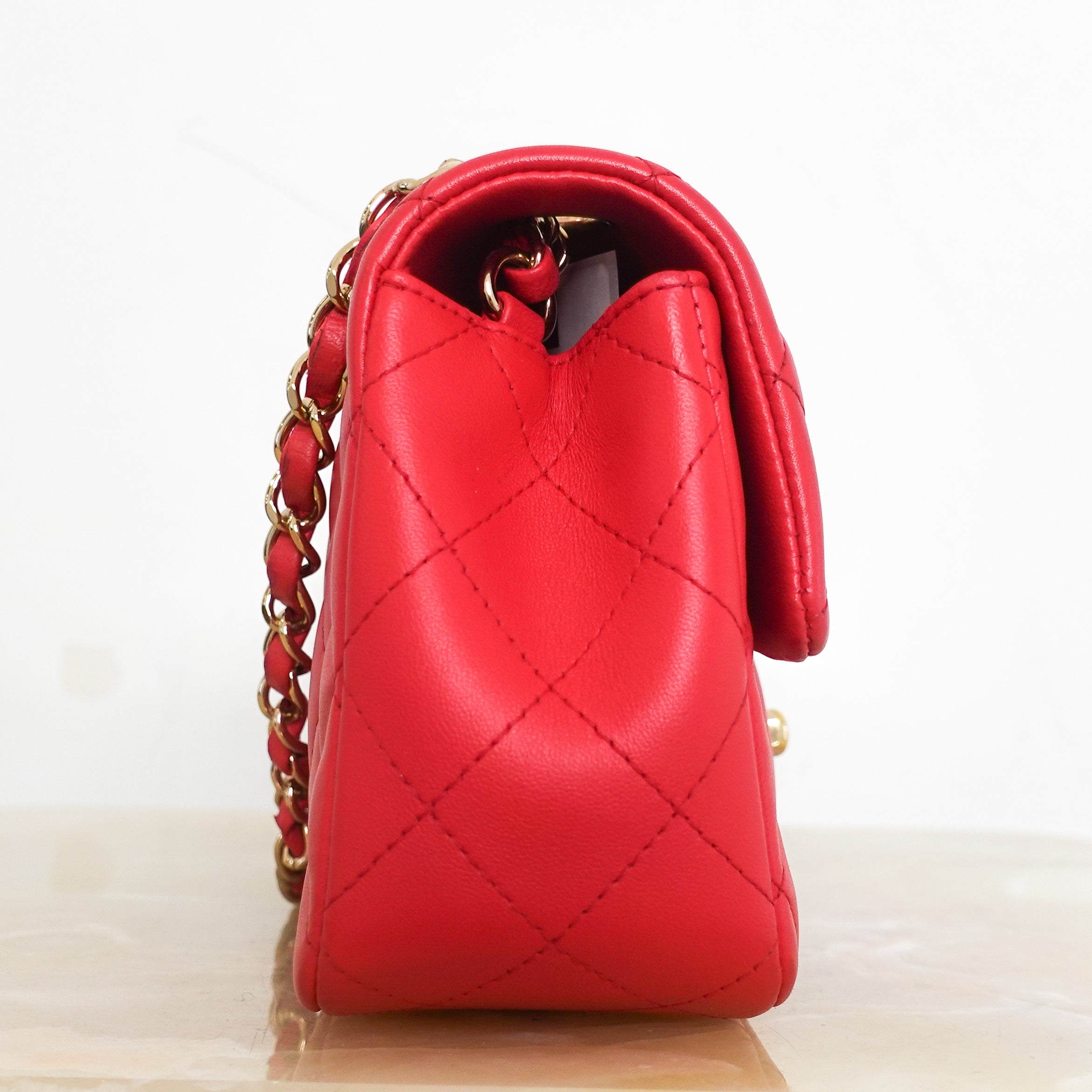 Red mini flap bag RRP £4550