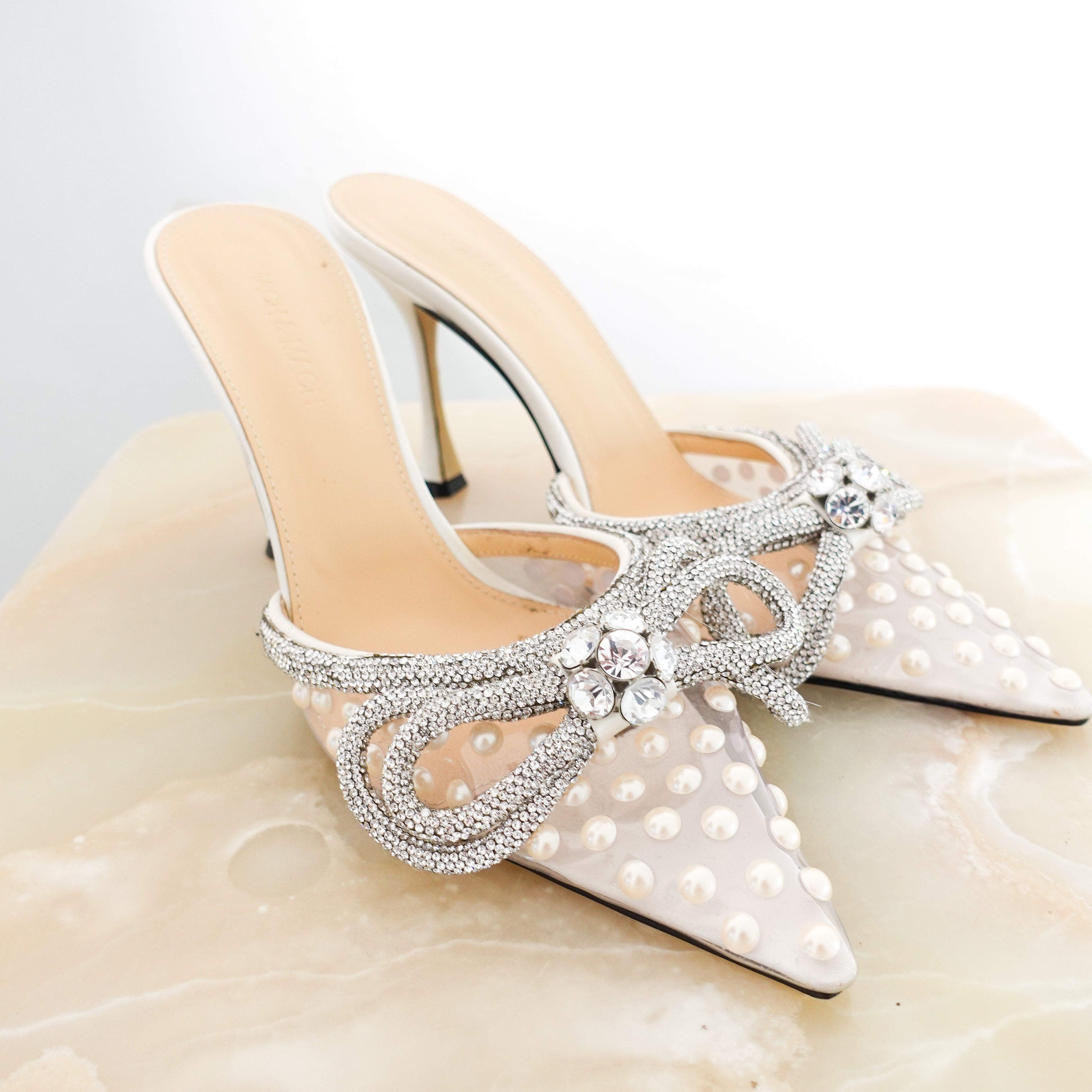 Heeled pearl and bow mules RRP £775