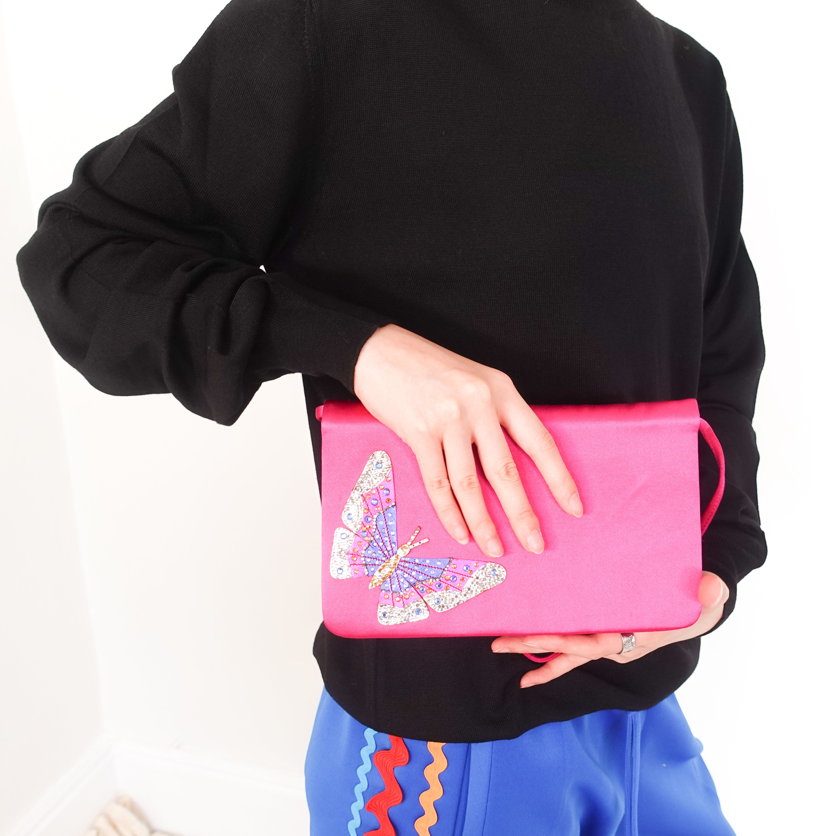 Hot pink clutch bag RRP £1k