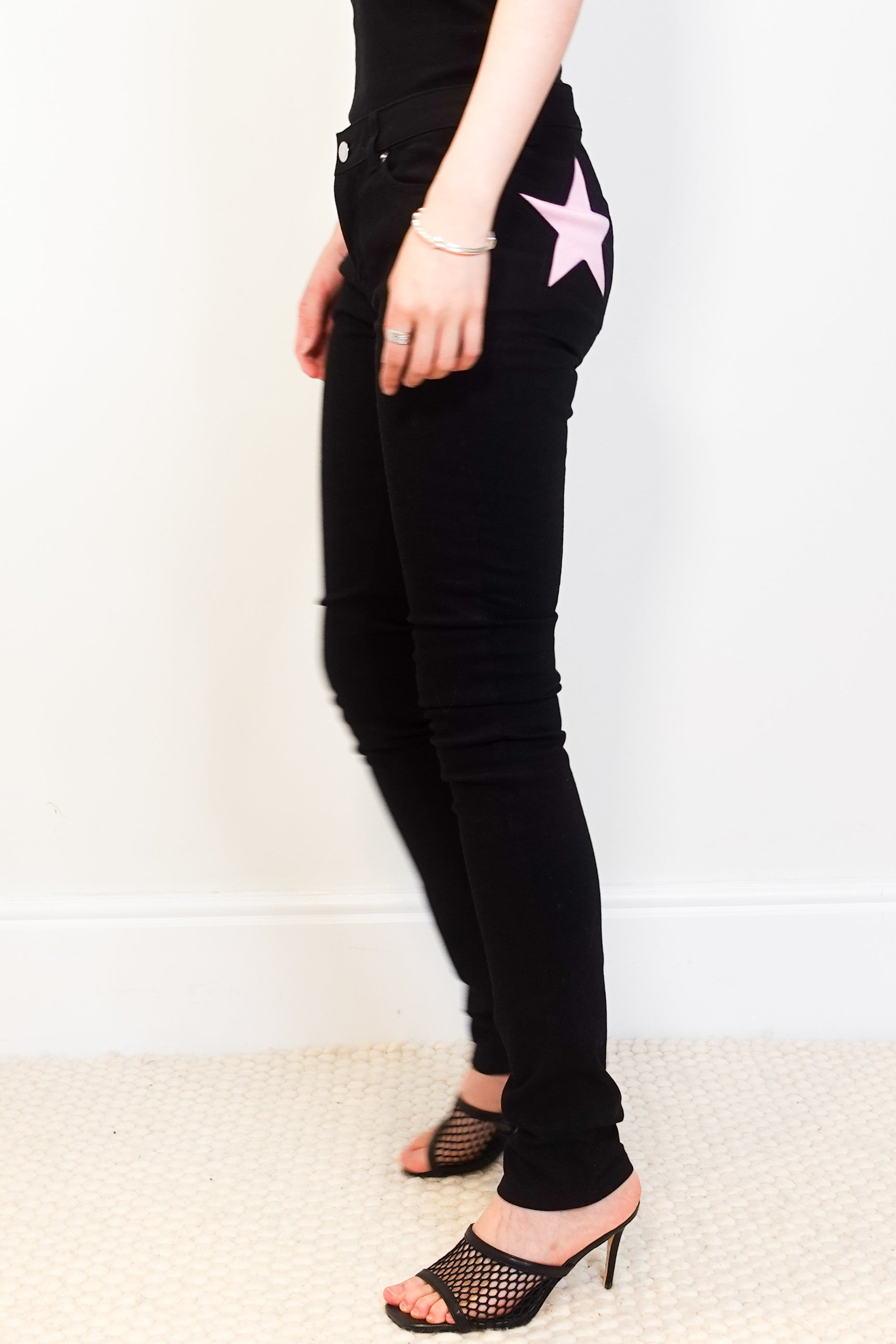 Skinny black star jeans RRP £325