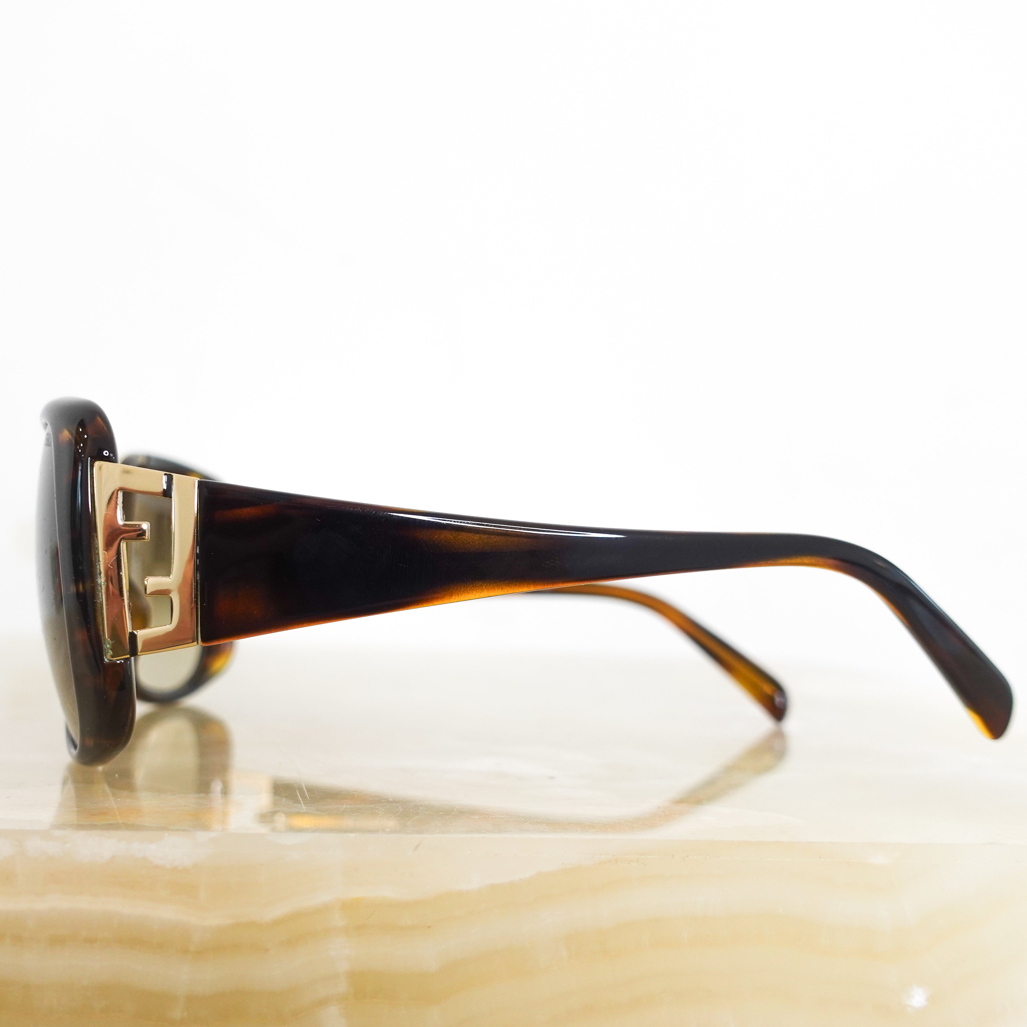 Brown tortoiseshell glasses RRP £290