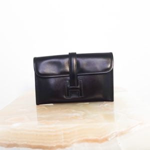 Jige black leather mini clutch