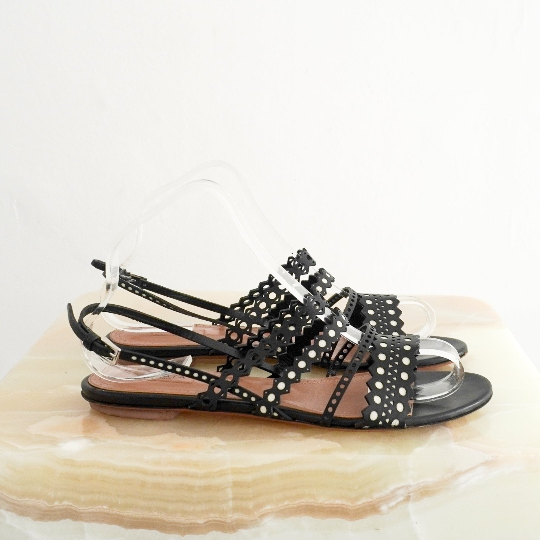 ALAÏA Laser-Cut Leather Flat Sandals in Black (RRP £690) | Authentic Preloved - Reloved Again
