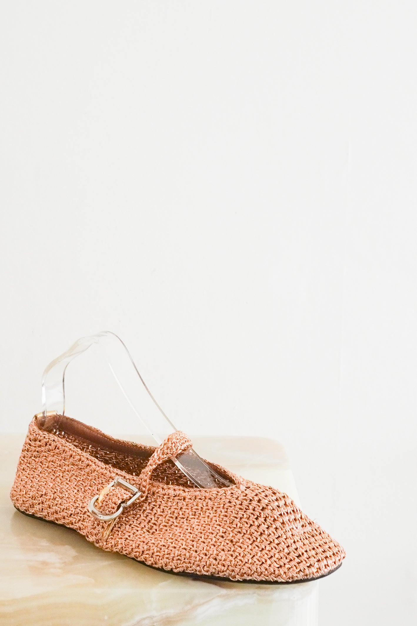 Alaïa Rose Gold Woven Raffia Flats front photo chelsea london
